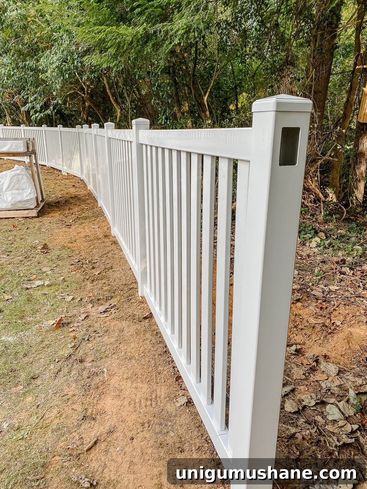 Vinyl Fence Installation: Costs, Materials, and Tips 19 white vinyl fence installation with Ply Gem