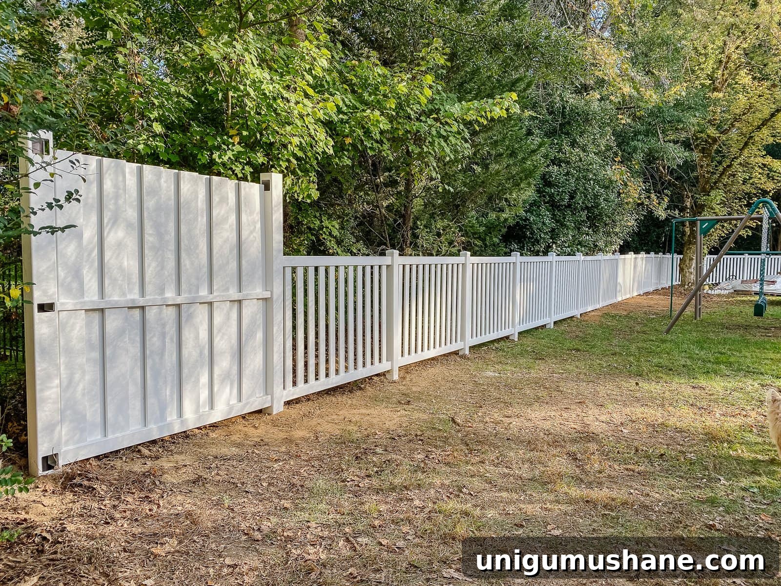 Vinyl Fence Installation: Costs, Materials, and Tips 20 white vinyl fence installation with Ply Gem in a backyard