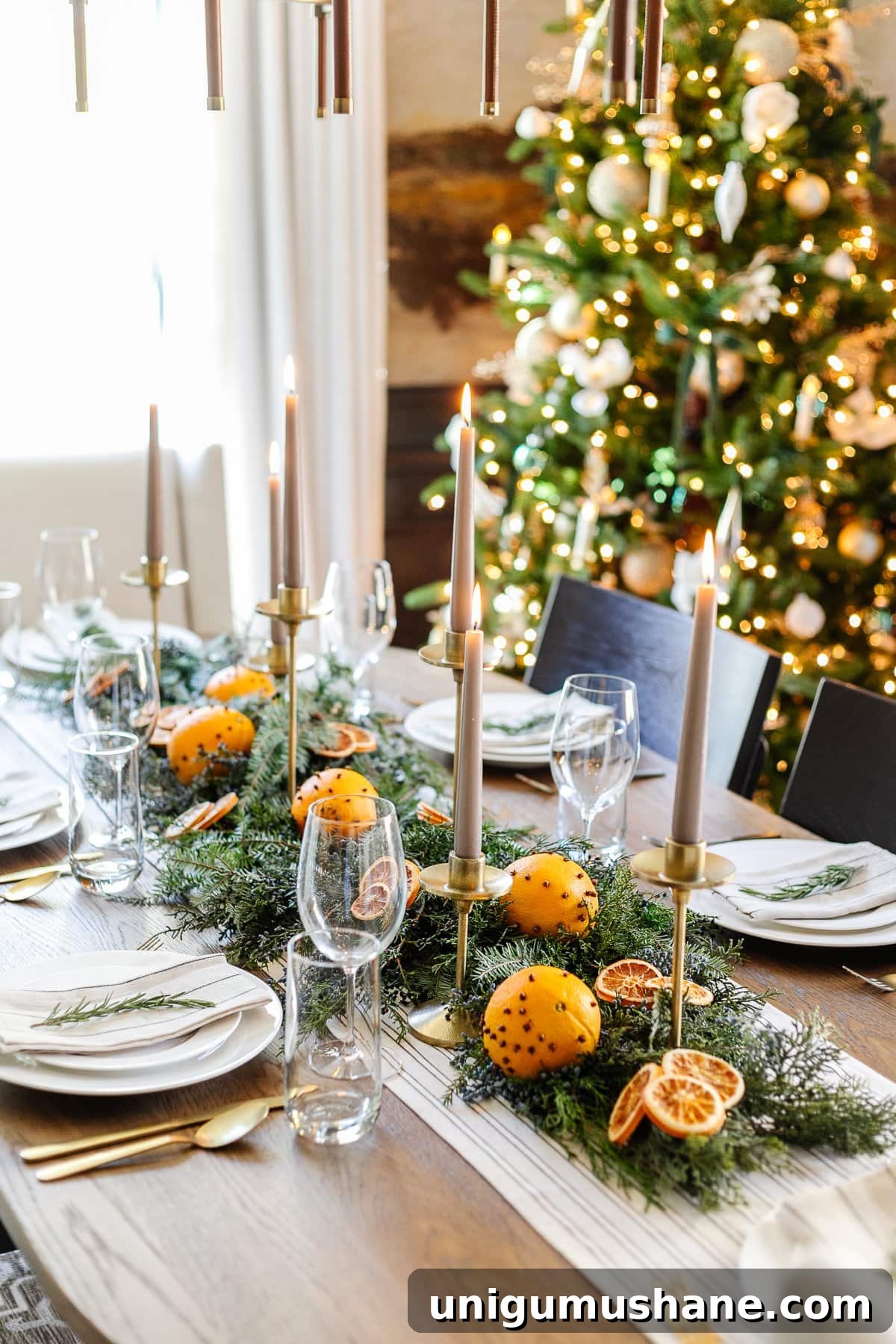 Holiday Housewalk 2021: Traditional Christmas Decorating Ideas 11 simple Christmas centerpiece using orange pomanders and evergreen branches
