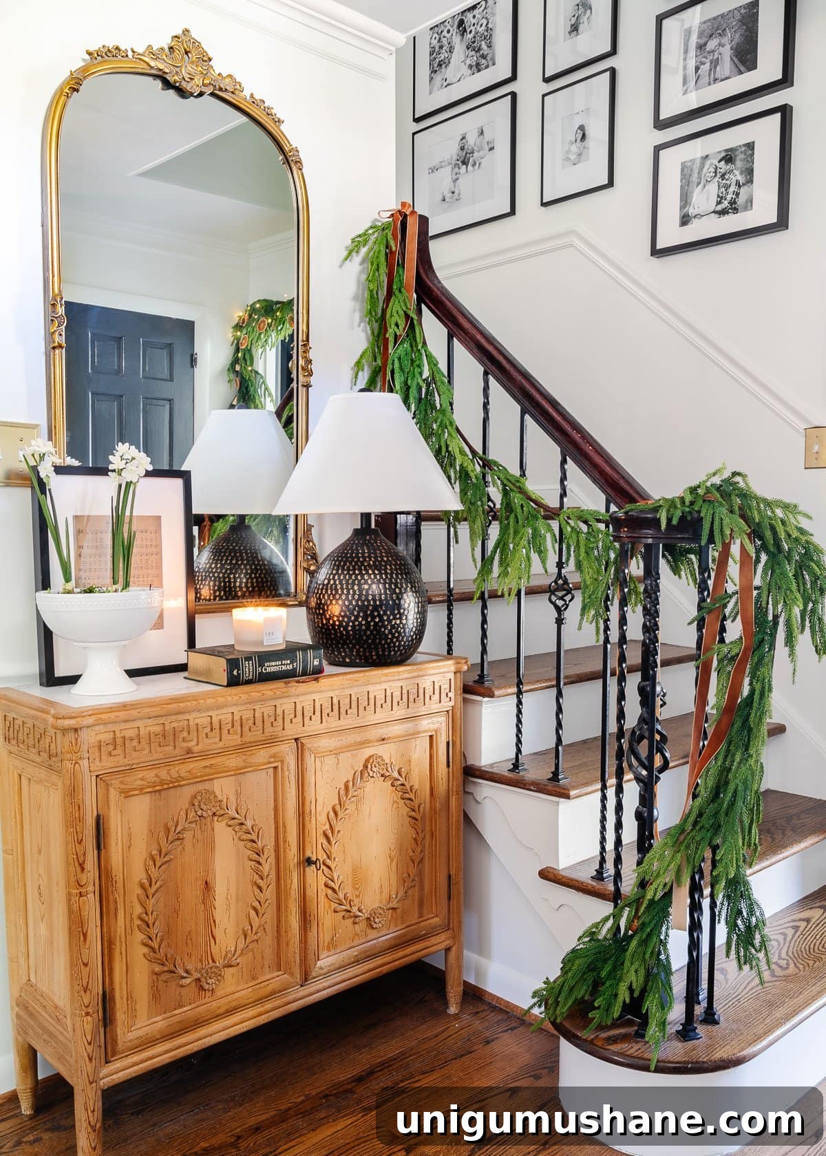 Holiday Housewalk 2021: Traditional Christmas Decorating Ideas 3 Christmas foyer decor ideas with garland on stairs and copper ribbon