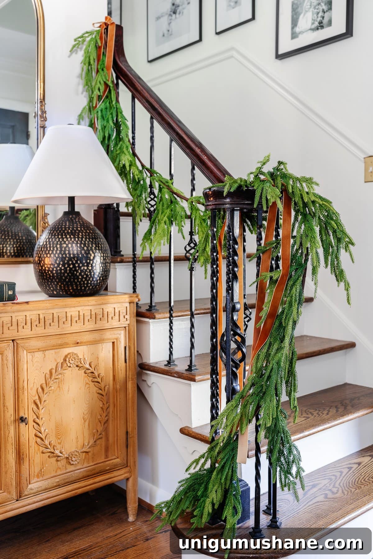 Holiday Housewalk 2021: Traditional Christmas Decorating Ideas 6 realistic garland on stairs for Christmas decor