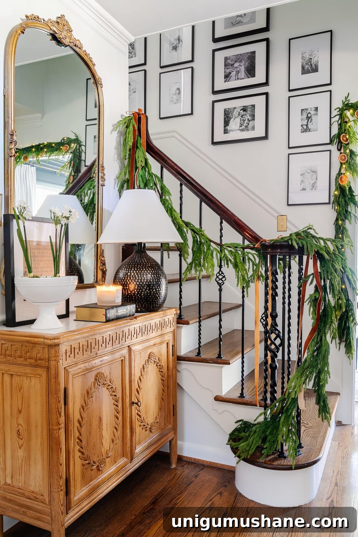 Holiday Housewalk 2021: Traditional Christmas Decorating Ideas 7 realistic garland on stairs for Christmas decor in foyer
