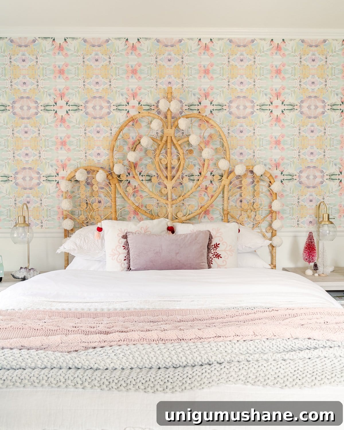 Christmas garland on a bedroom headboard