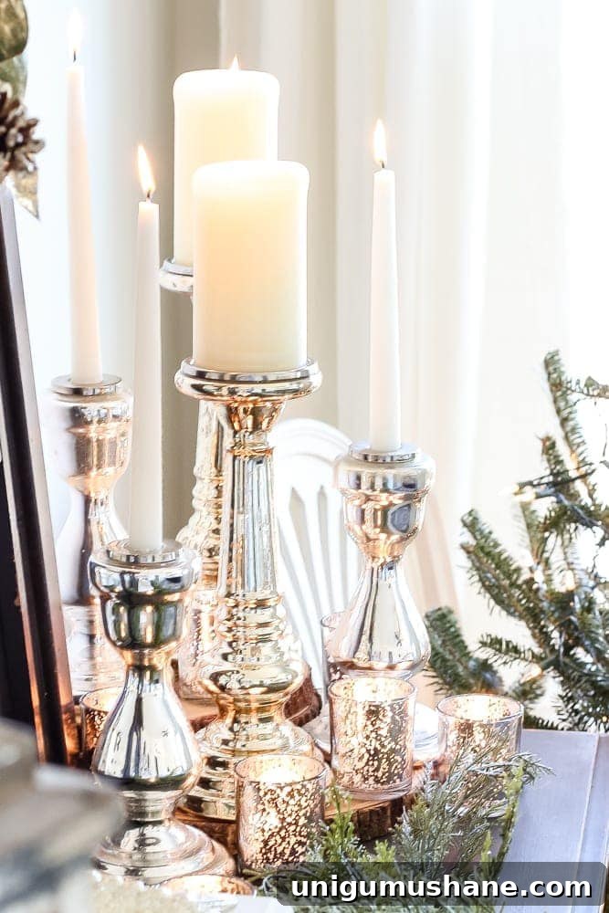 mercury glass candlesticks on a dresser