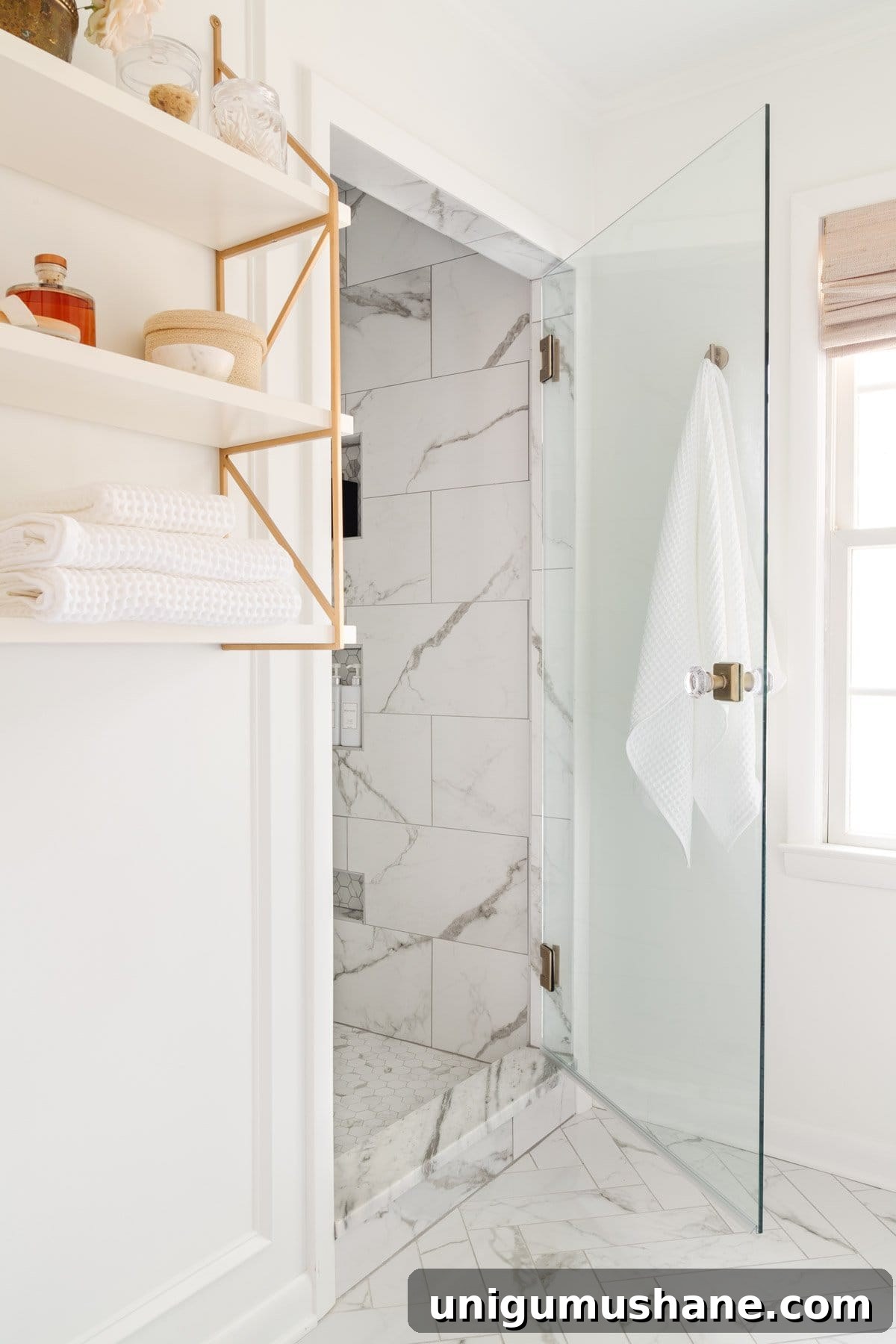 How Much Does a Bathroom Remodel Cost? Budget Breakdown 4 bathroom renovation cost after - shower with ceramic marble look tile and frameless glass door