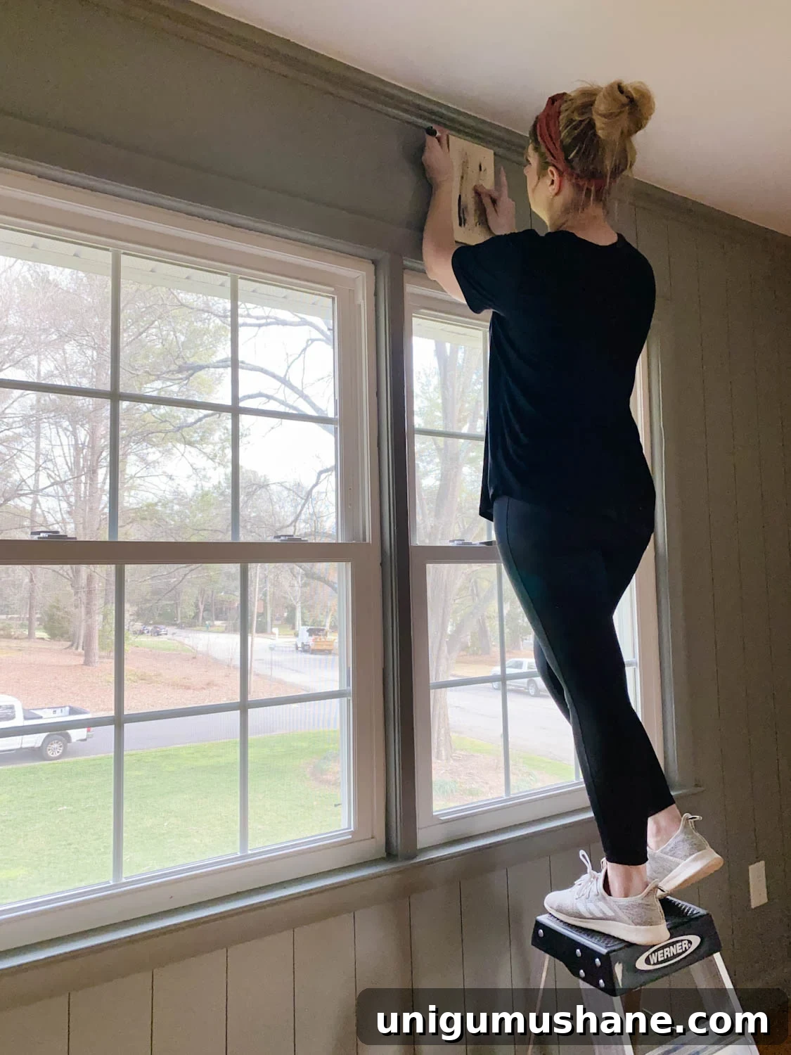 DIY Faux Wall Planking: Transform a Room for $20 11 Tracing 1x6 boards with Sharpie paint pens for faux paneled walls over a window
