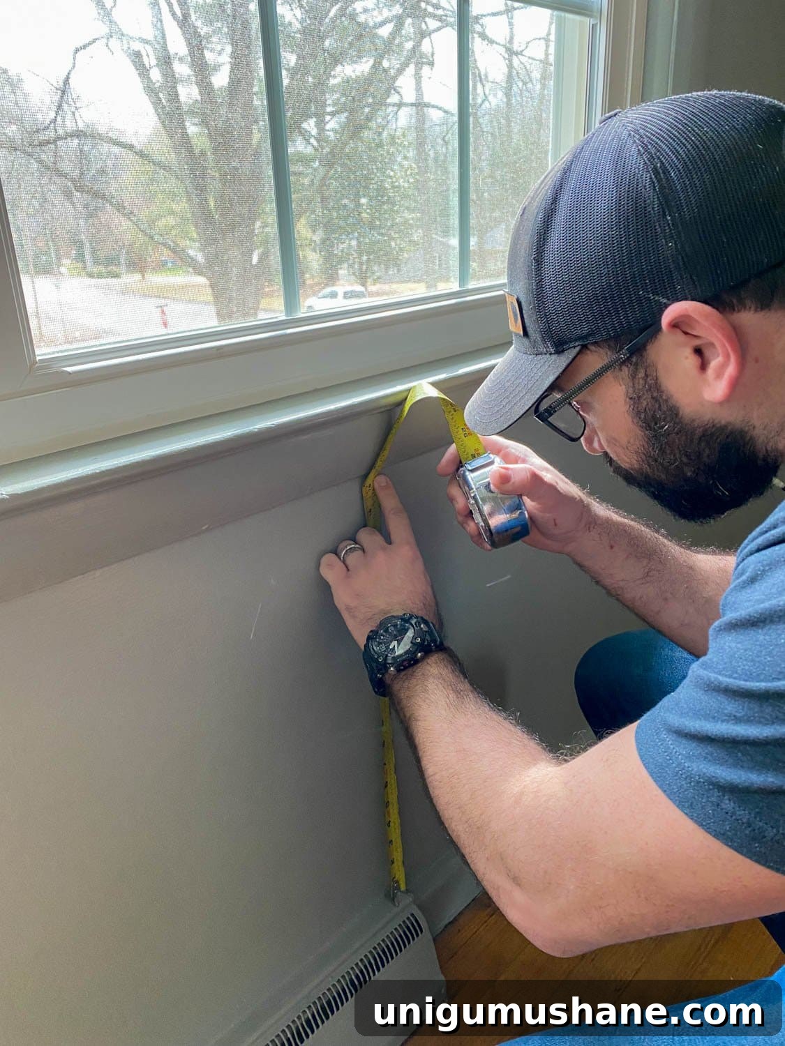 DIY Faux Wall Planking: Transform a Room for $20 6 measuring underneath windows for cutting plank spacers
