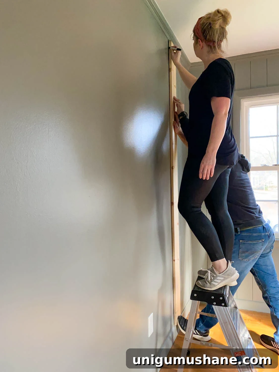DIY Faux Wall Planking: Transform a Room for $20 8 using 1x6 boards as spacers for tracing lines to mimic paneled walls with Sharpie paint pens