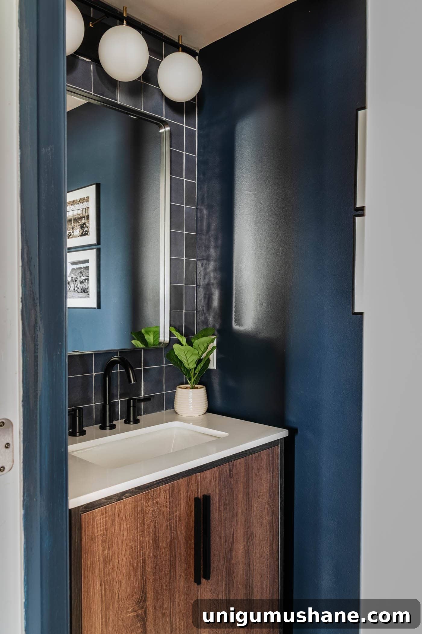 Small Modern Powder Room Makeover for Your Bachelor Pad 10 stacked tile focal wall behind a vanity in a small bathroom at a bachelor pad