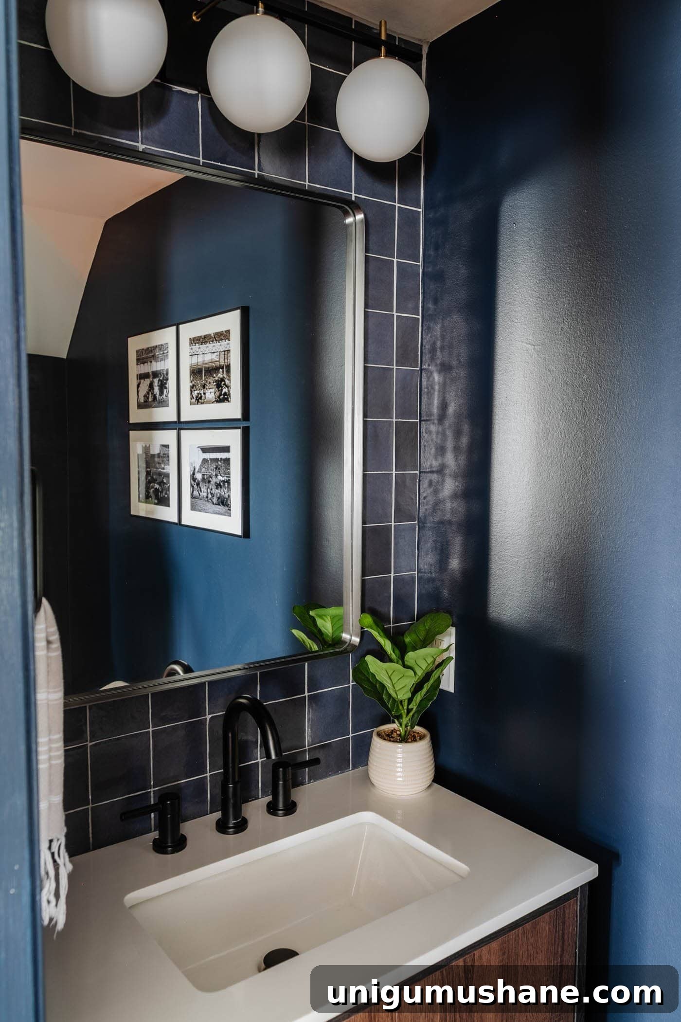 Small Modern Powder Room Makeover for Your Bachelor Pad 8 using stacked tile on a wall for a modern style focal point behing a vanity