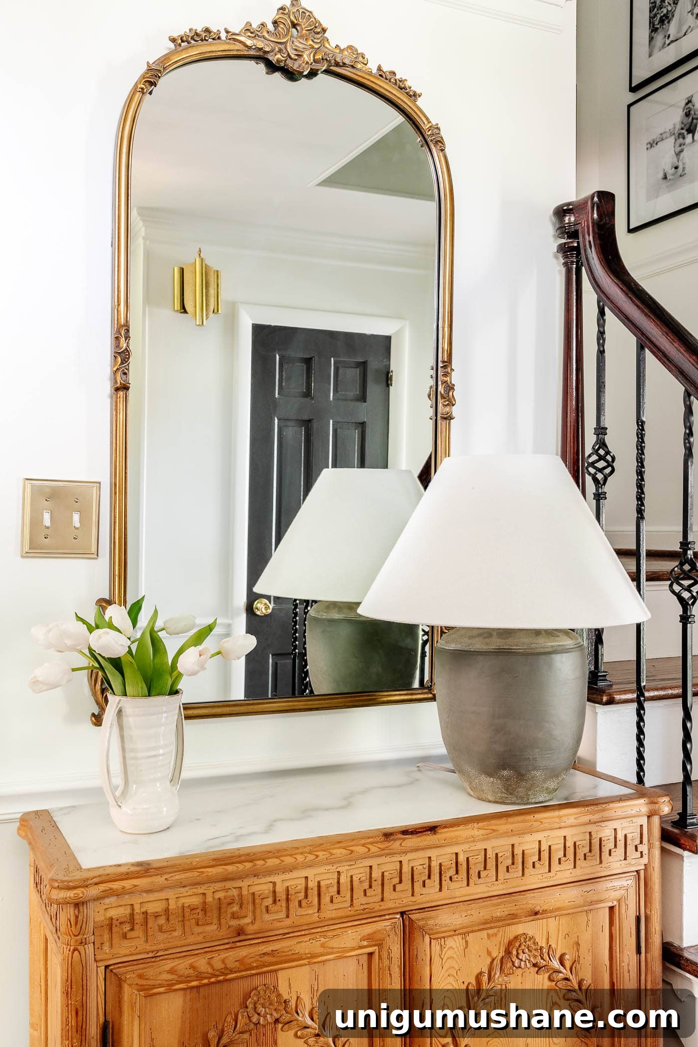 Style an Entry Table Like a Pro: Step-by-Step Guide 6 flanking a table lamp with a vase of flowers