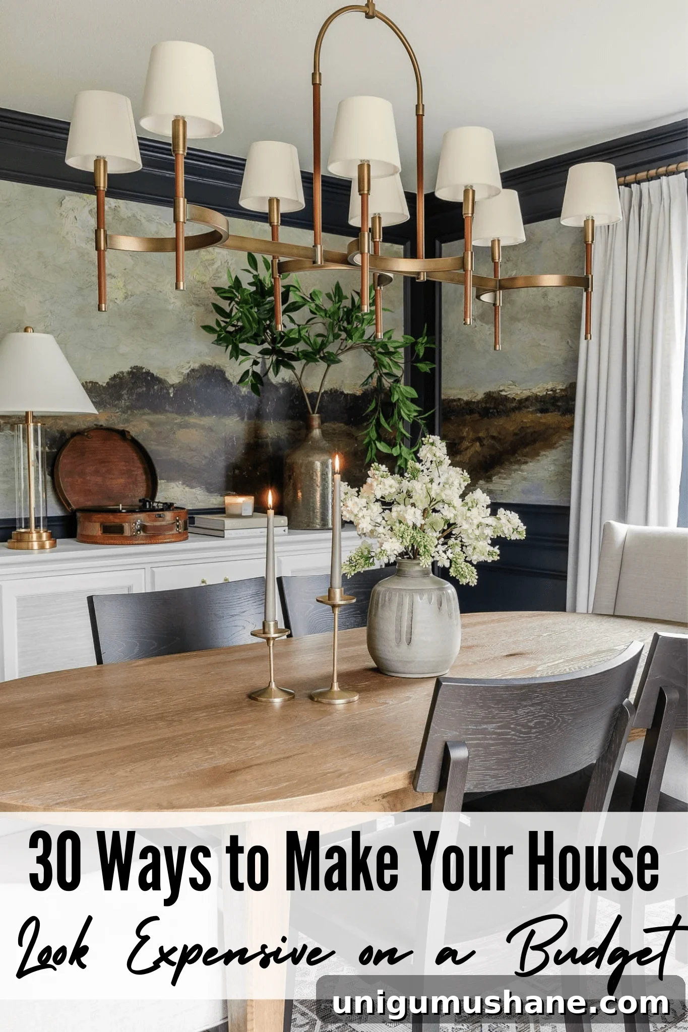 30 ways to make your house look expensive on a budget - dining room with navy blue paint and mural wallpaper