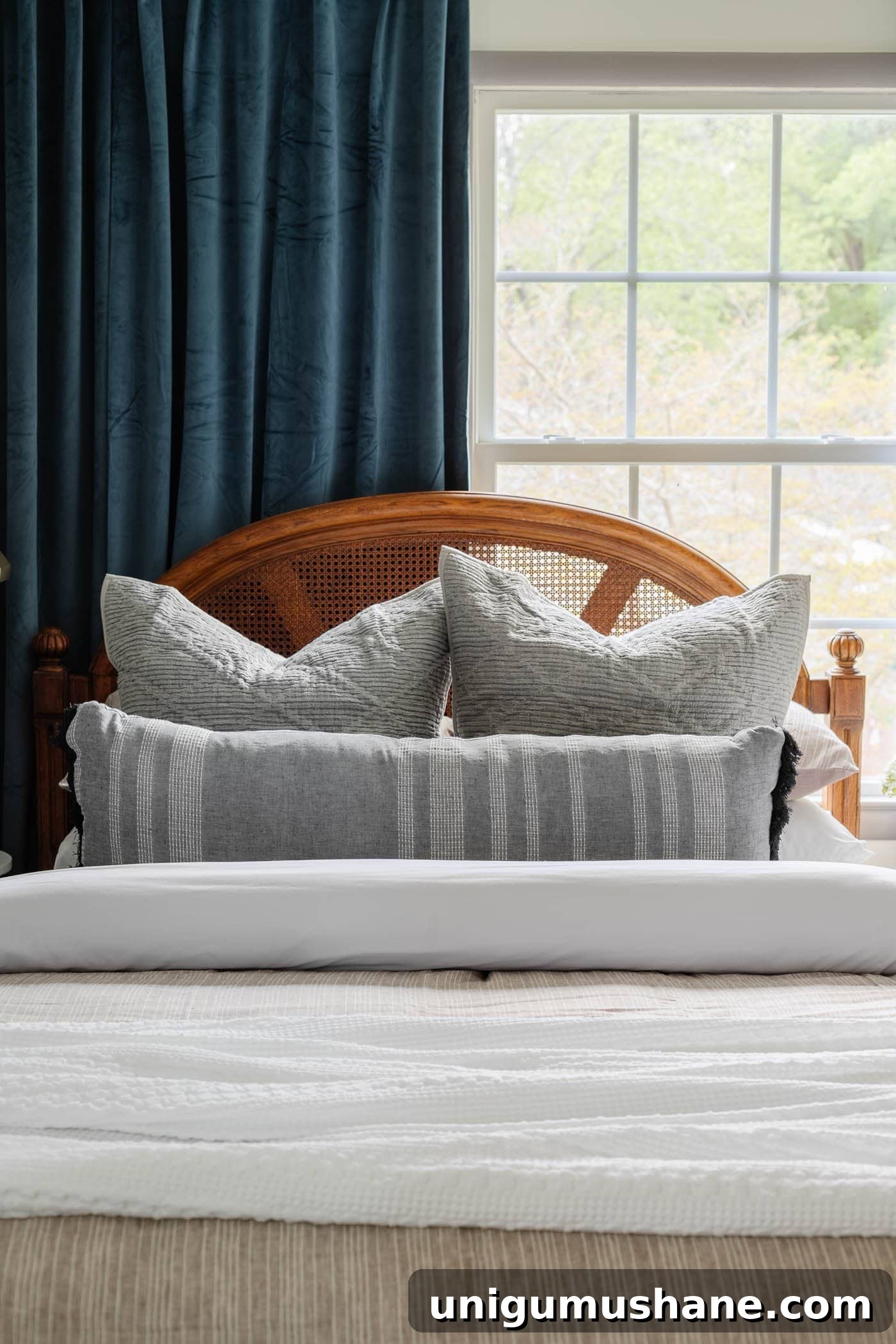 How to Redecorate a Room in Under an Hour: Guest Bedroom Refresh 10 how to redecorate you room - bed in front of window off center
