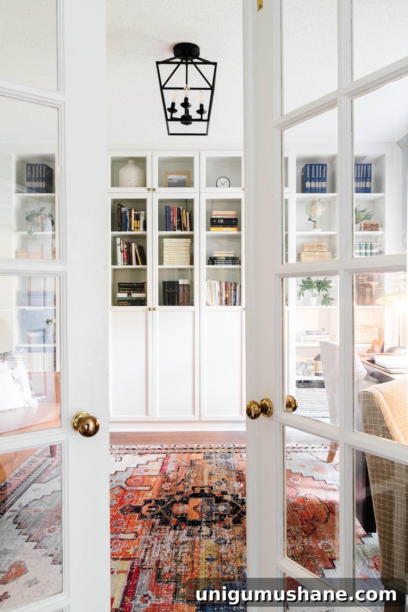 home office with French doors and built in IKEA shelves