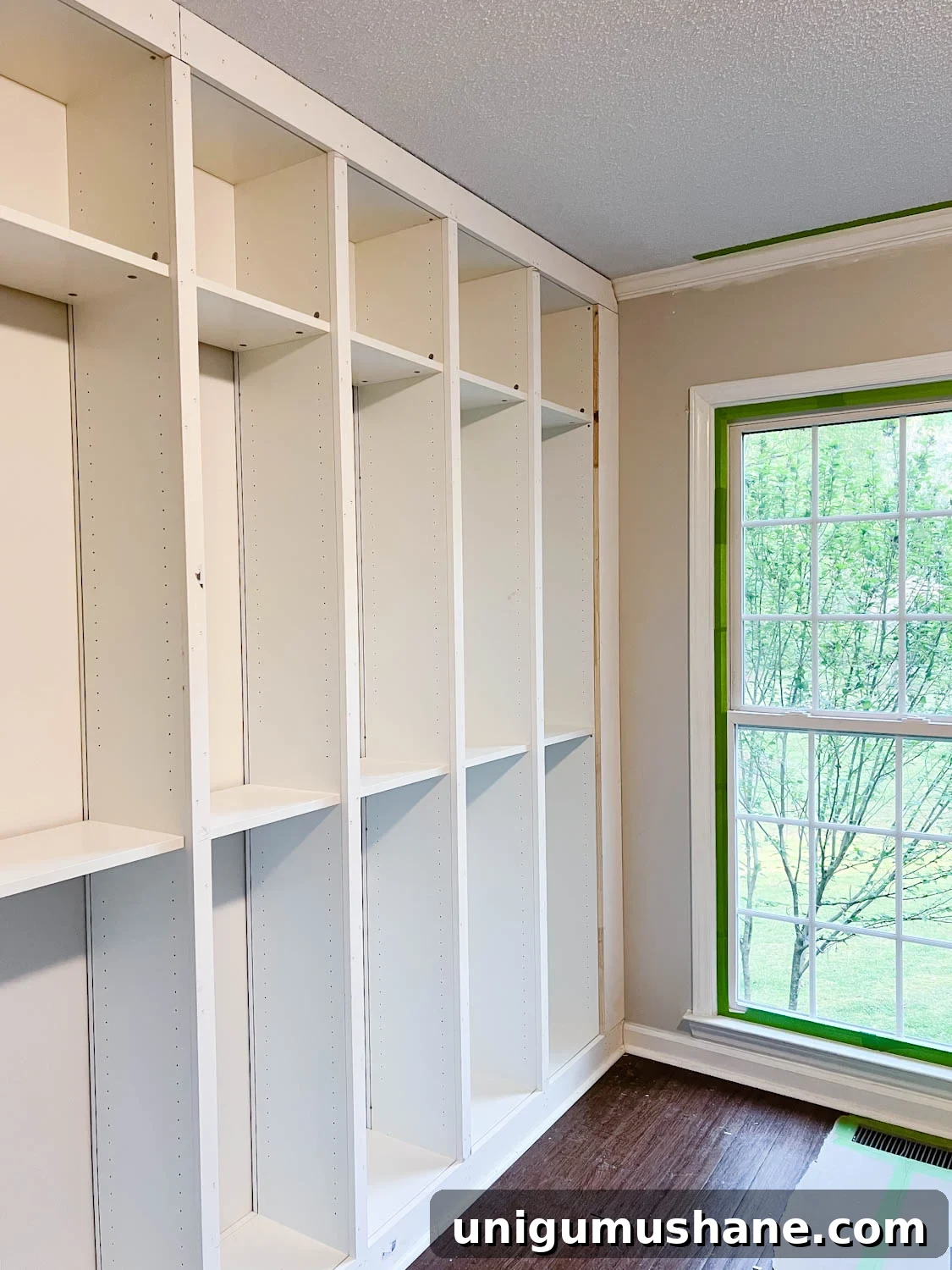Convert IKEA Billy Bookcases into Built-In Bookshelves 20 added 1x2 boards to the fronts of bookcases to hide the cracks where they meet