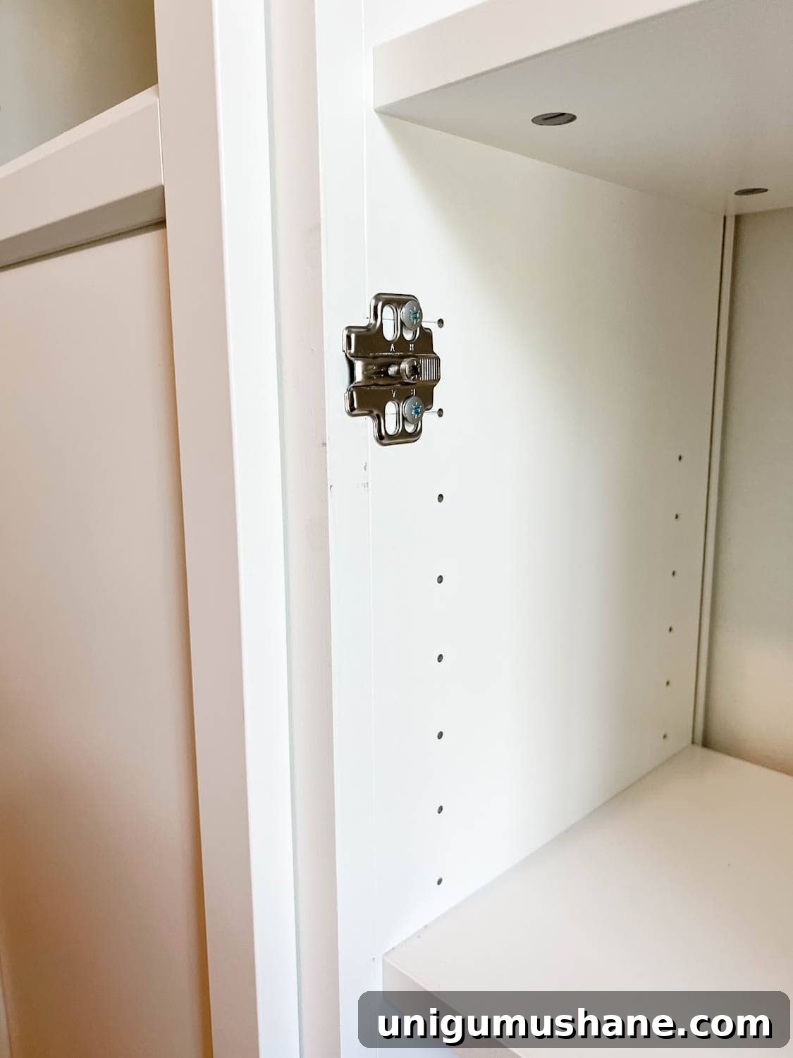 Convert IKEA Billy Bookcases into Built-In Bookshelves 32 door hardware added to bookcases to hang Oxberg doors