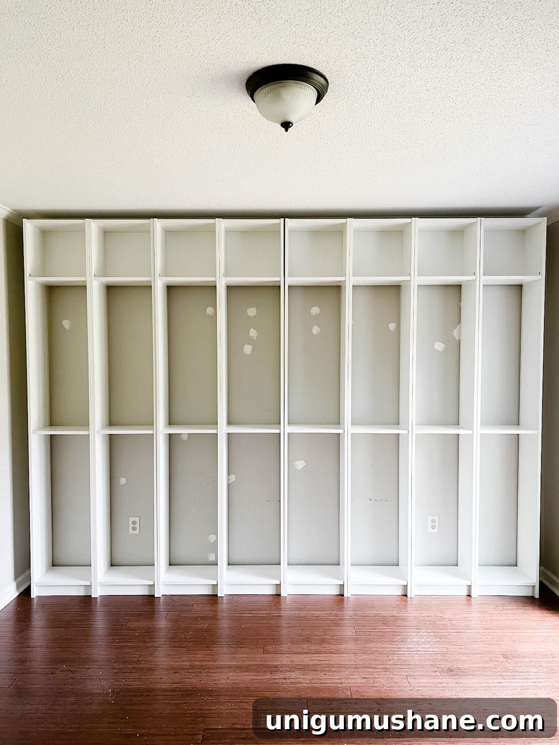 Convert IKEA Billy Bookcases into Built-In Bookshelves 5 assembled IKEA Billy bookcases ready to make into built in bookshelves
