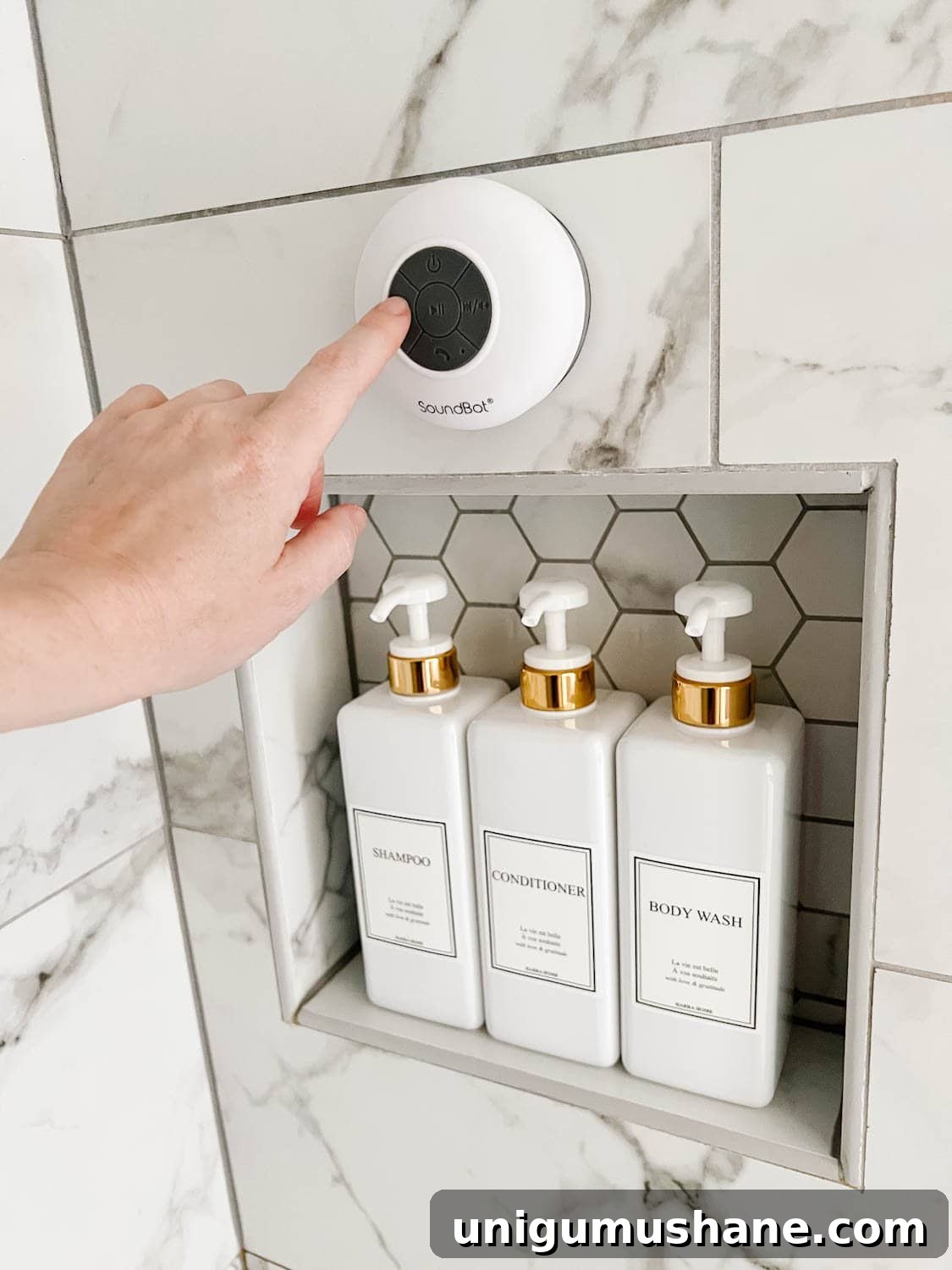 Affordable Spa Bathroom Ideas to Create a Luxury Home Retreat 4 bluetooth shower speaker and matching soap dispensers to create a spa bathroom experience