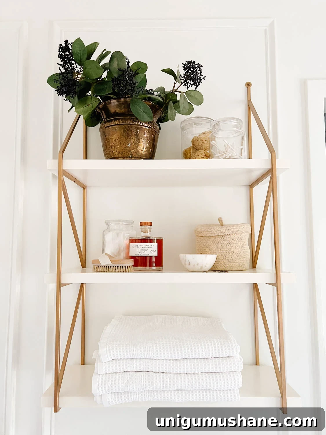 Affordable Spa Bathroom Ideas to Create a Luxury Home Retreat 9 open shelving in a bathroom with apothecary jars and waffle weave towels