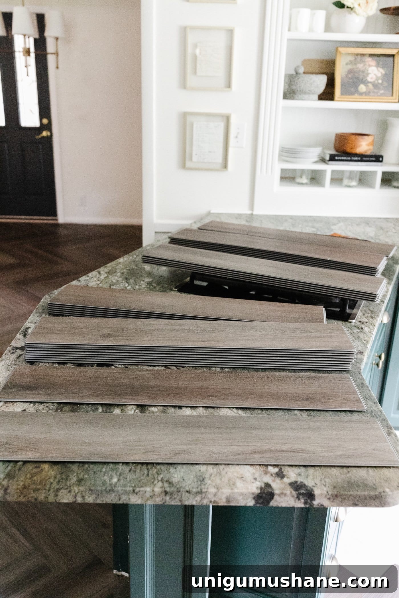 LVP flooring stacked to vary designs and patterns during installation