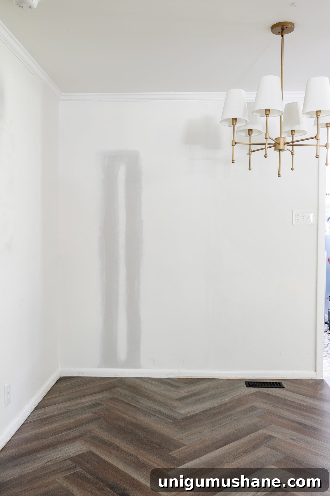 finished herringbone vinyl floor in a breakfast nook