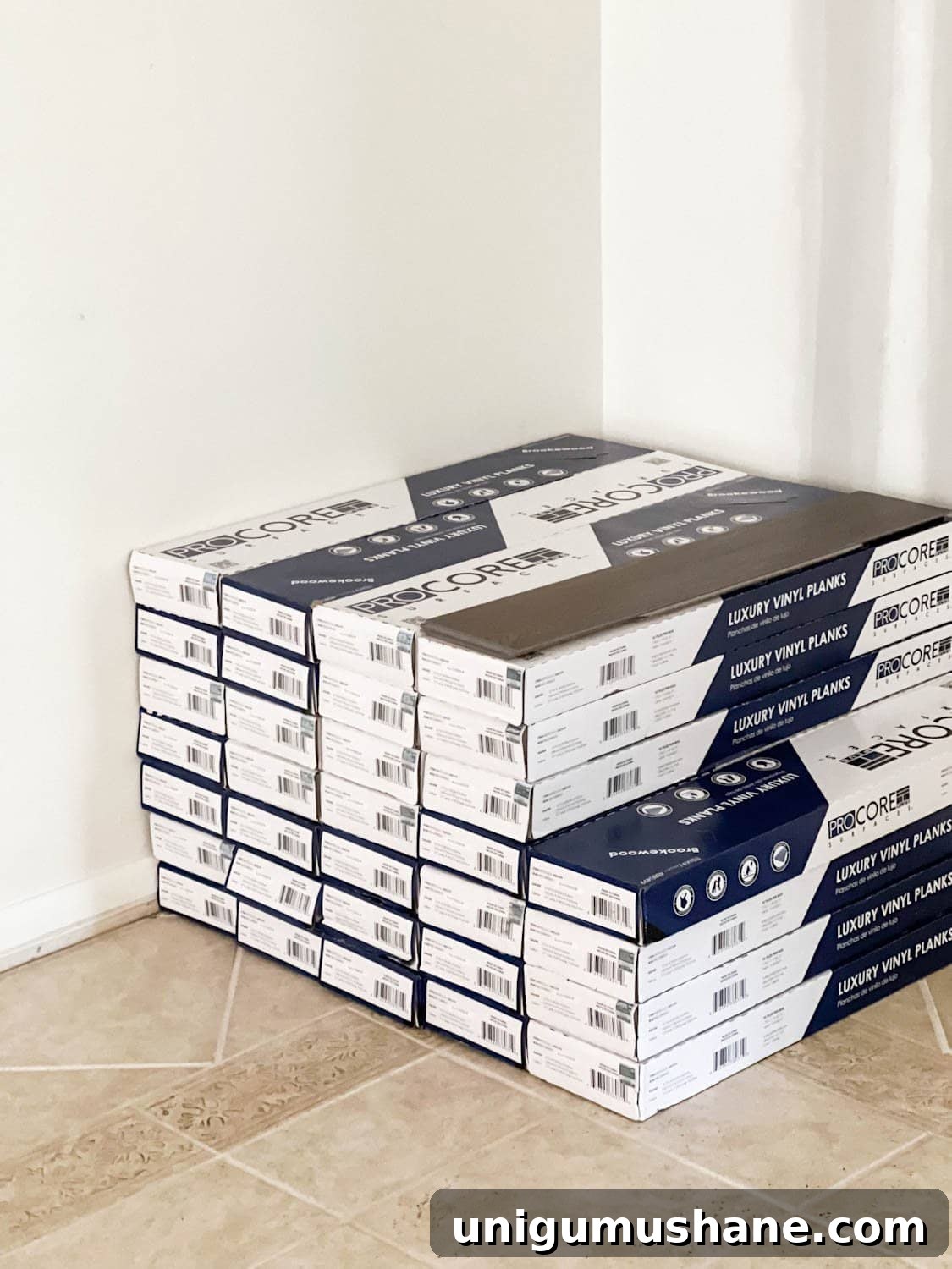 stack of ProCore Floors luxury vinyl plank floors on top of tile