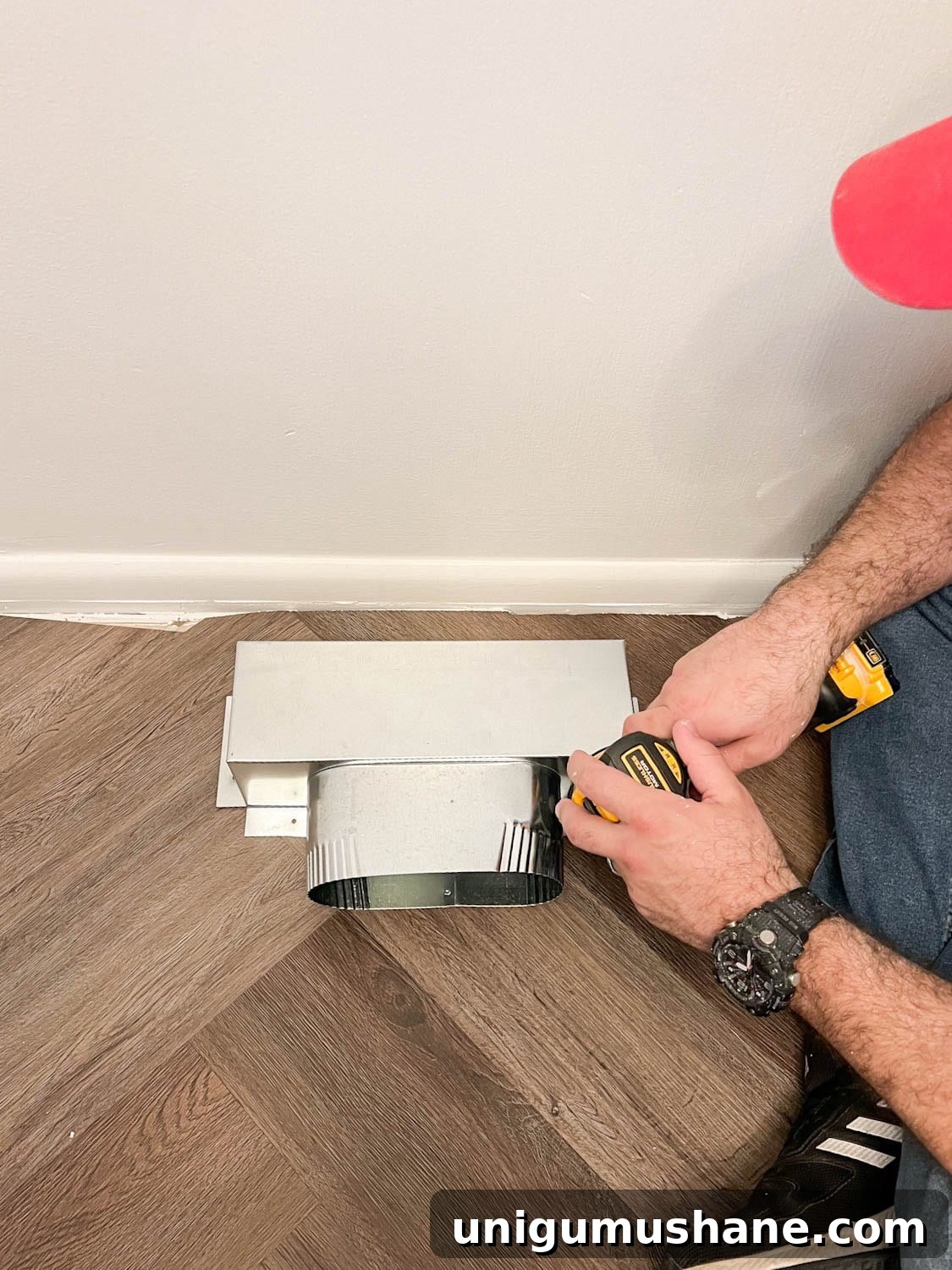 Transform Corner Banquette and Redirect Under Cabinet Air Vents 7 attaching a Toe Ductor box for an air vent redirect under built-in