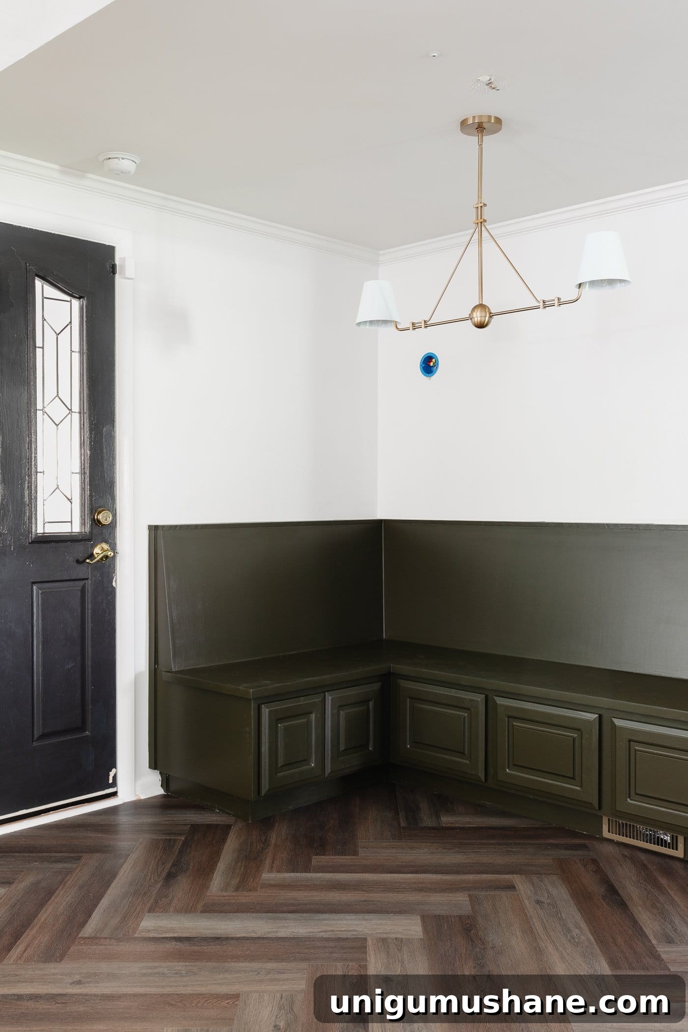 Stylish Banquette Bench Seating Ideas for Every Budget 2 breakfast nook banquette painted olive green with shaded linear chandelier and herringbone floors