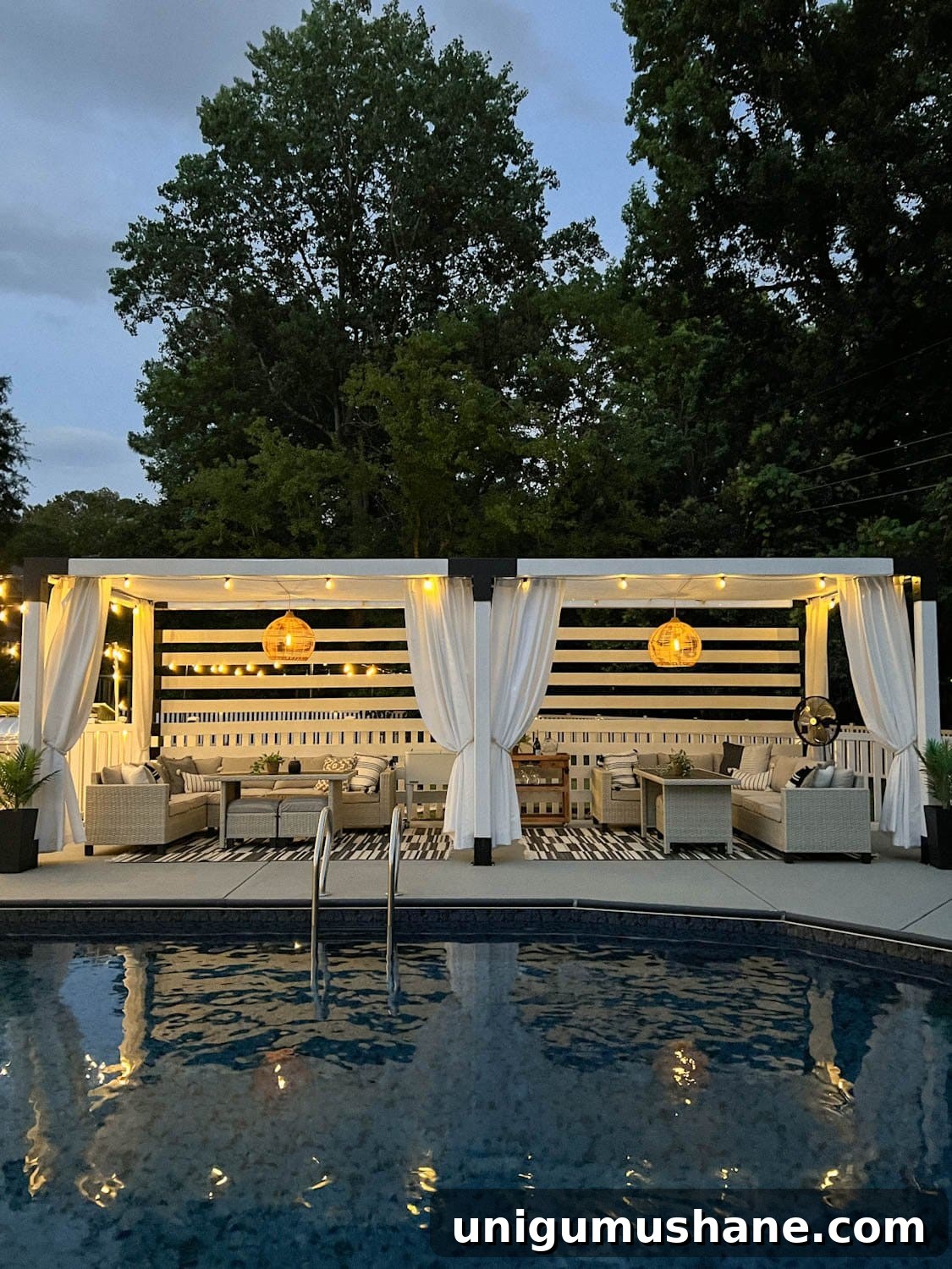 Backyard Lighting Ideas You Can Install Yourself 15 poolside cabana pergola in a backyard with string lights and solar pendant lights and white outdoor curtains