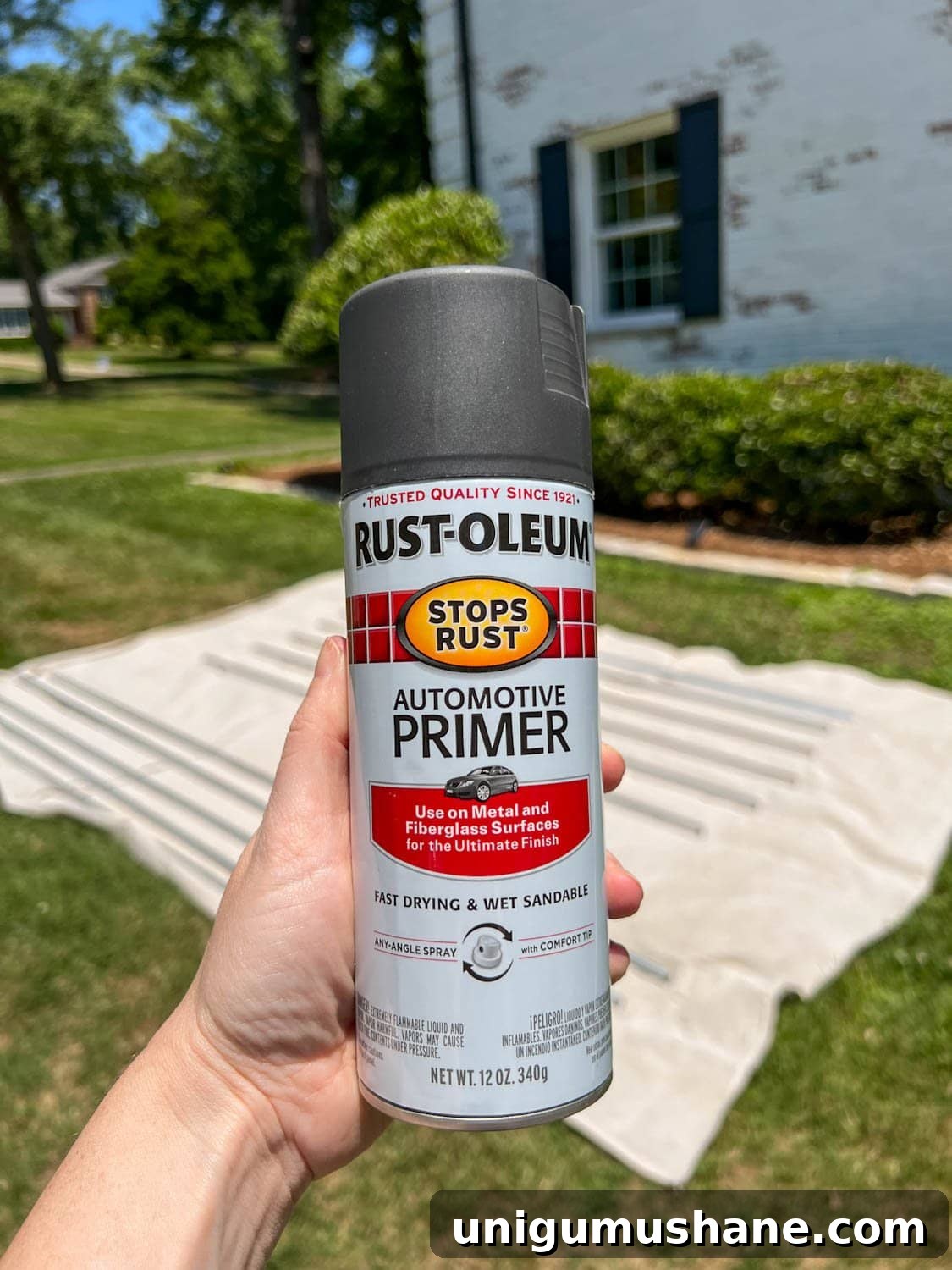 How to Hang Outdoor String Lights Anywhere in Your Backyard 11 black automotive primer to paint on conduit poles