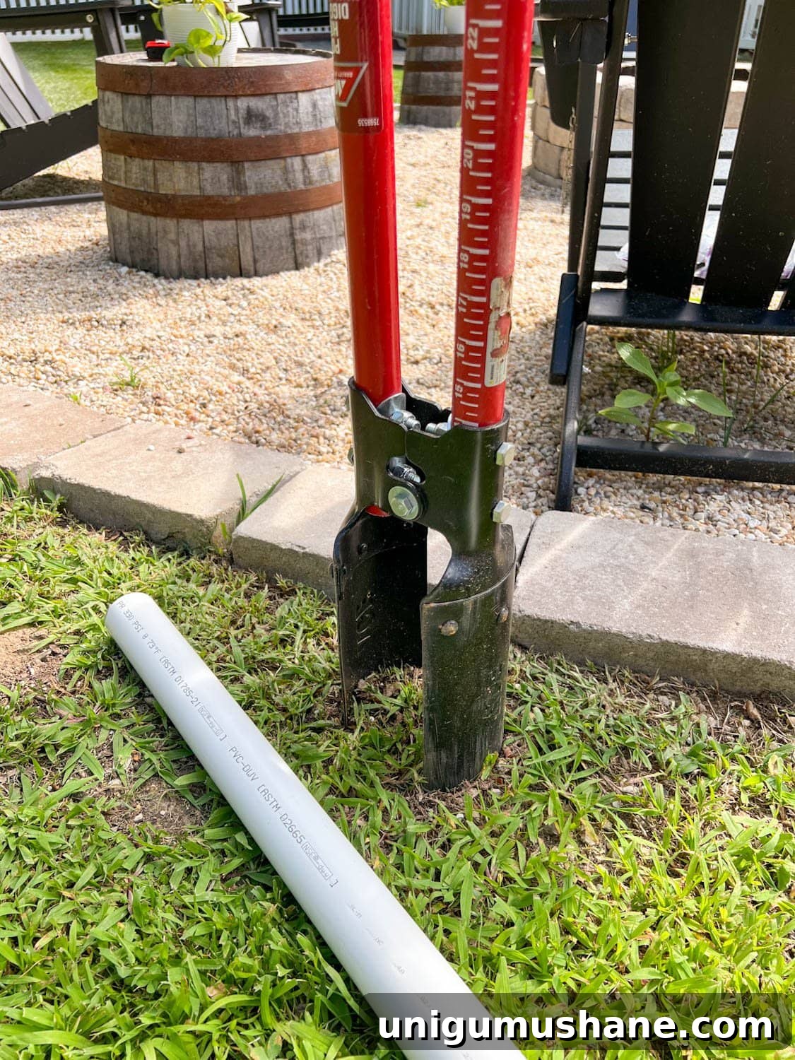 How to Hang Outdoor String Lights Anywhere in Your Backyard 14 a post hole digger and 2' long PVC pipe