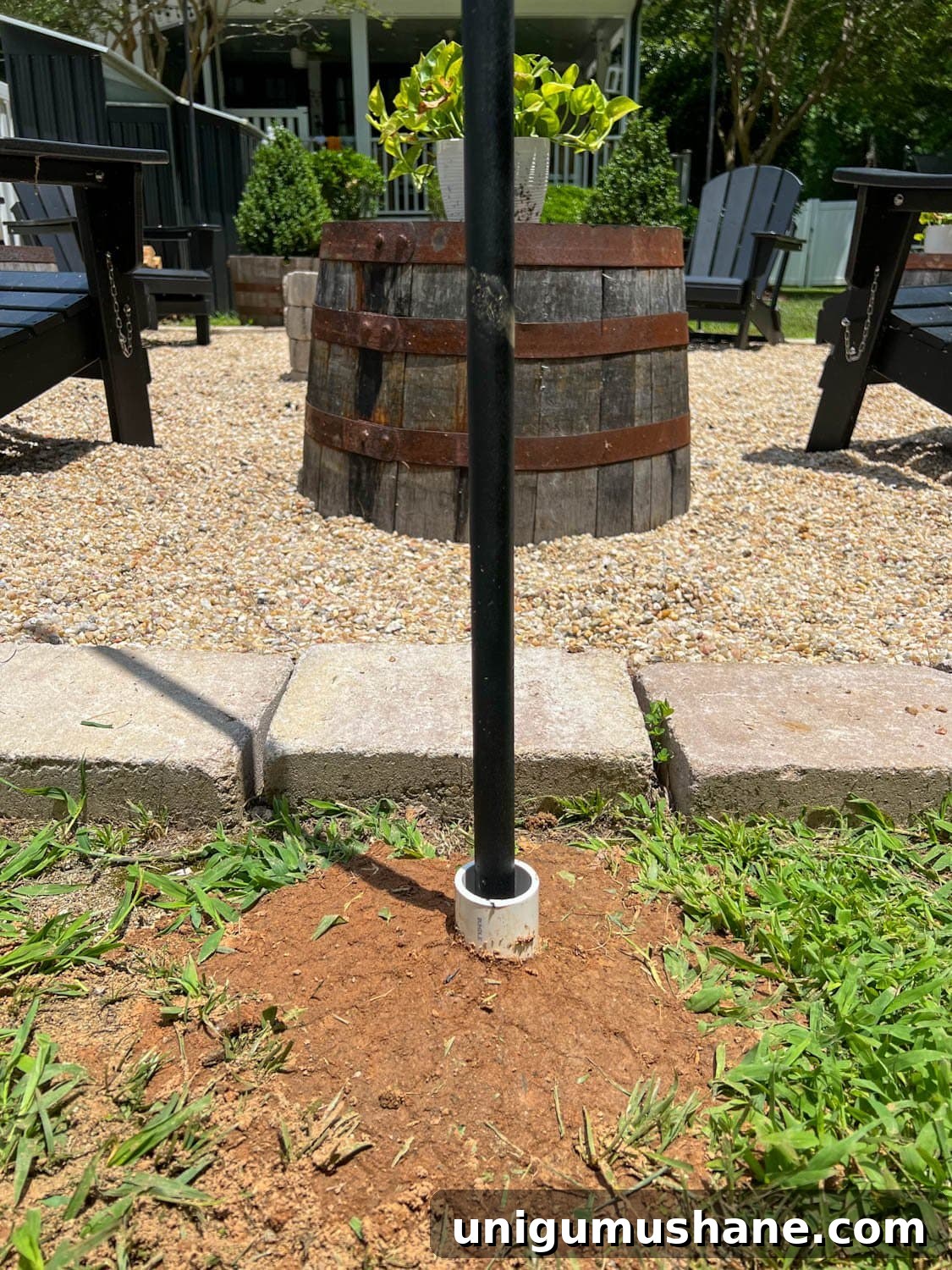 How to Hang Outdoor String Lights Anywhere in Your Backyard 16 DIY string light pole in the ground with PVC pipe to anchor it