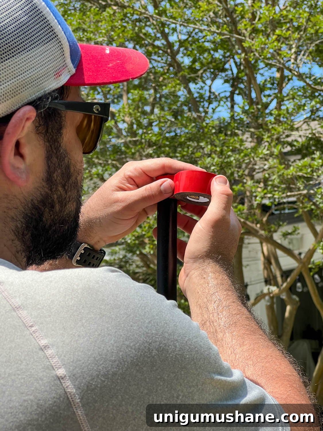 How to Hang Outdoor String Lights Anywhere in Your Backyard 17 attaching squeeze connectors to light poles using mounting tape
