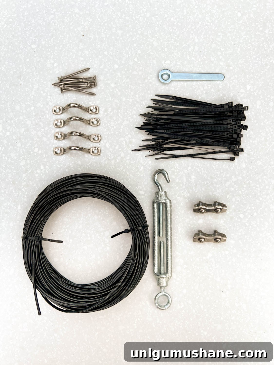 How to Hang Outdoor String Lights Anywhere in Your Backyard 18 a light mounting kit with a cable, zip ties, and hardware