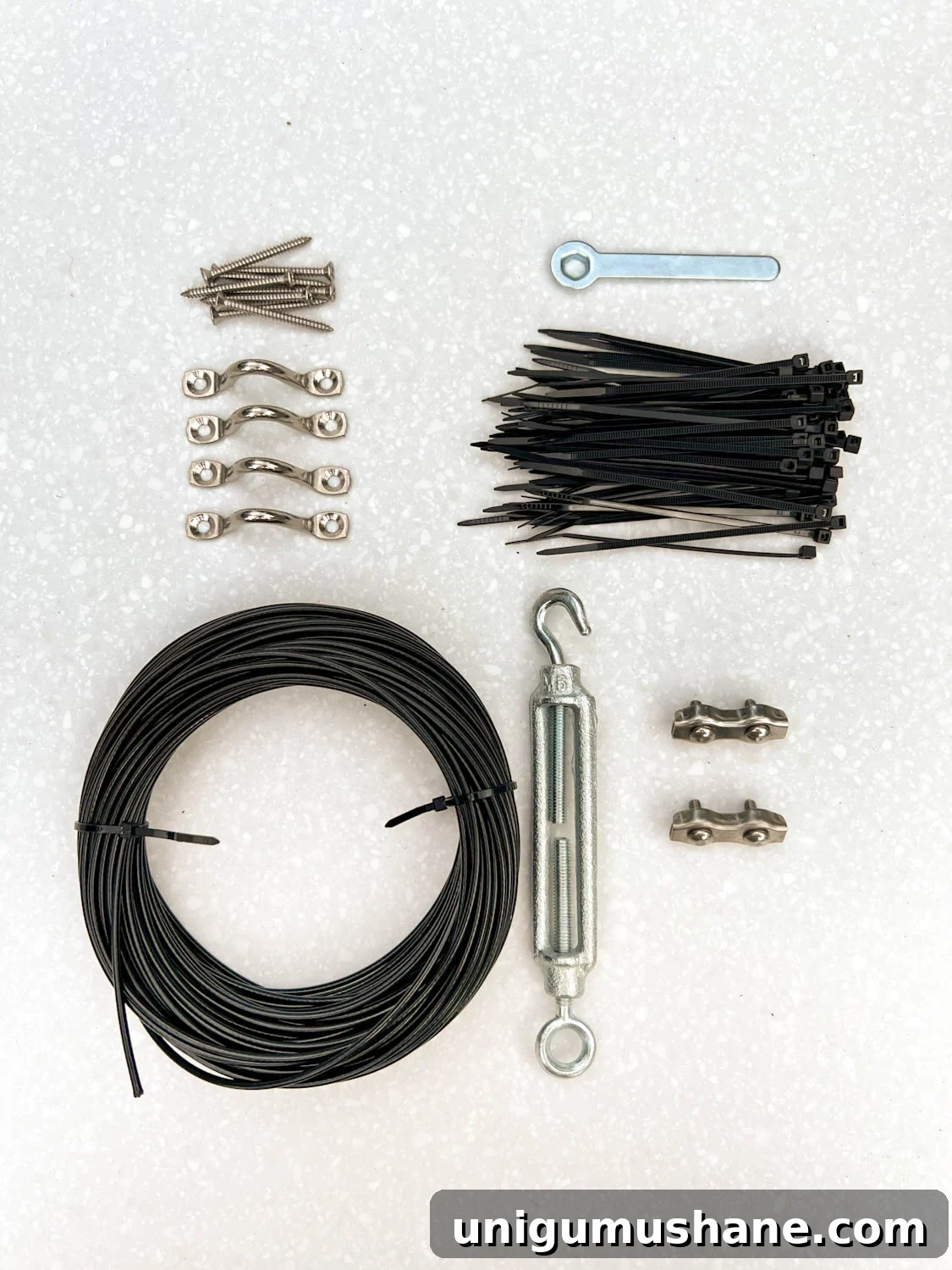 How to Hang Outdoor String Lights Anywhere in Your Backyard 29 string light kit with cable, hardware, and brackets