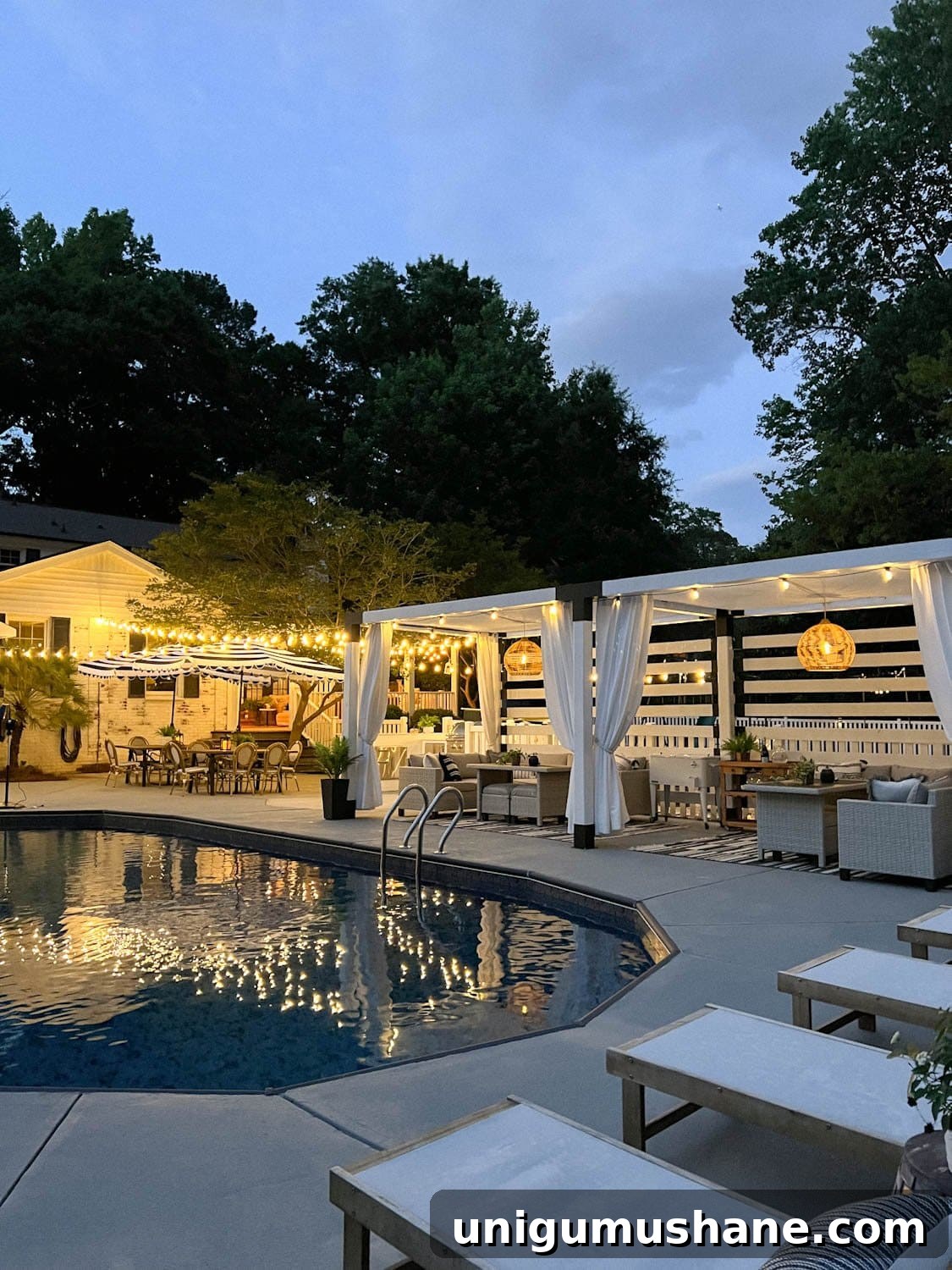 How to Hang Outdoor String Lights Anywhere in Your Backyard 35 string lights around a pool at night with pergola