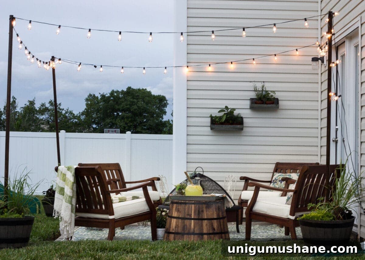 How to Hang Outdoor String Lights Anywhere in Your Backyard 45 planter posts with string lights hanging around a patio
