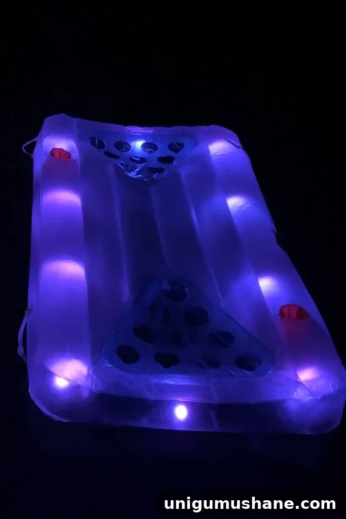 Must-Have Pool Toys for Kids and Adults This Summer 7 light up beer pong pool float glowing in the dark in water