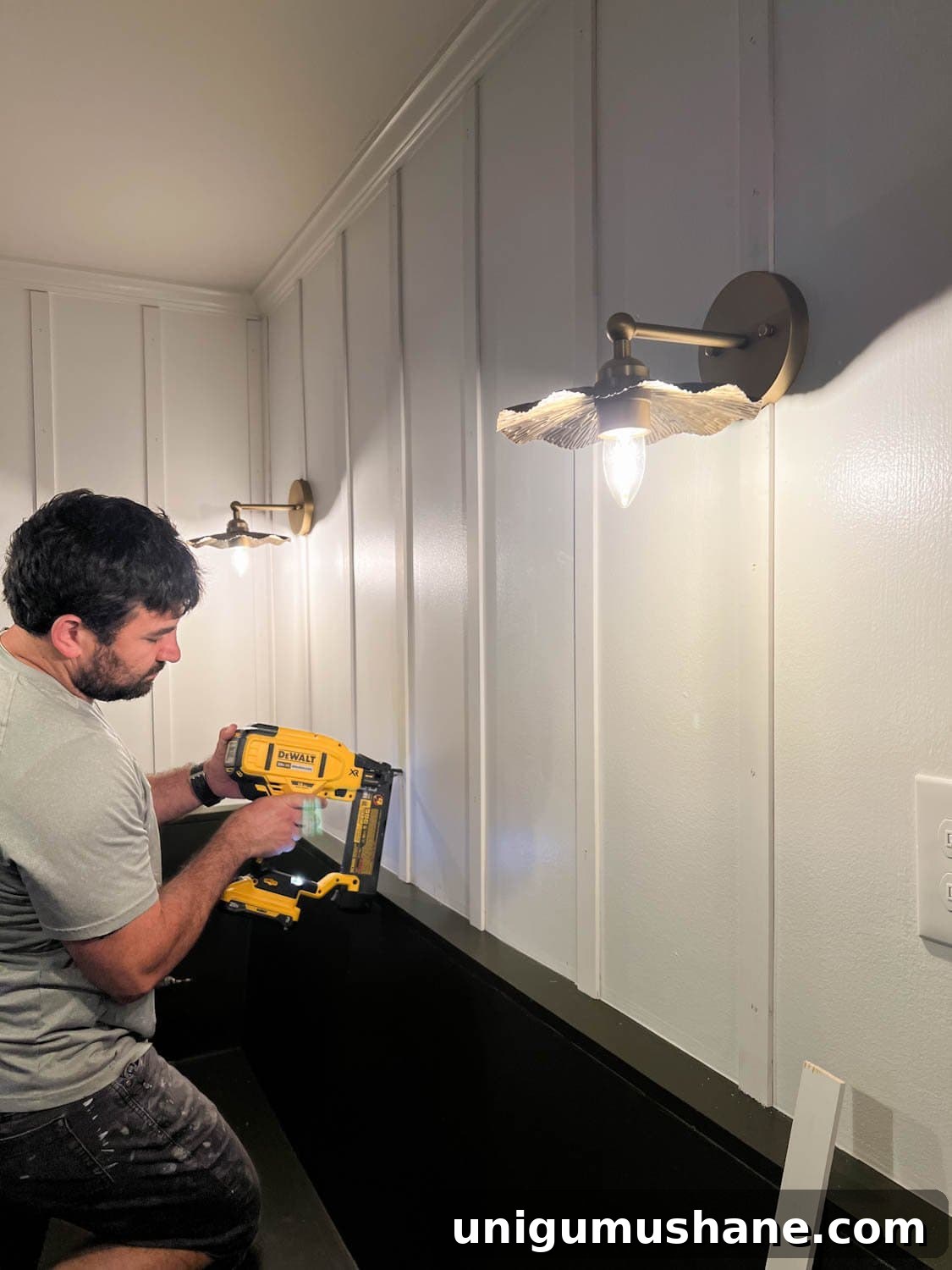 nailing lattice strips to a wall for DIY batten wall molding