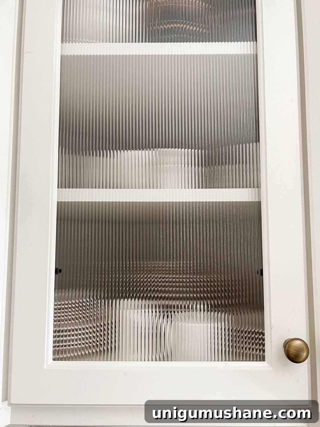 Decorative Window Film Ideas to Transform Home Glass on a Budget 3 reeded glass kitchen cabinet door with decorative window film