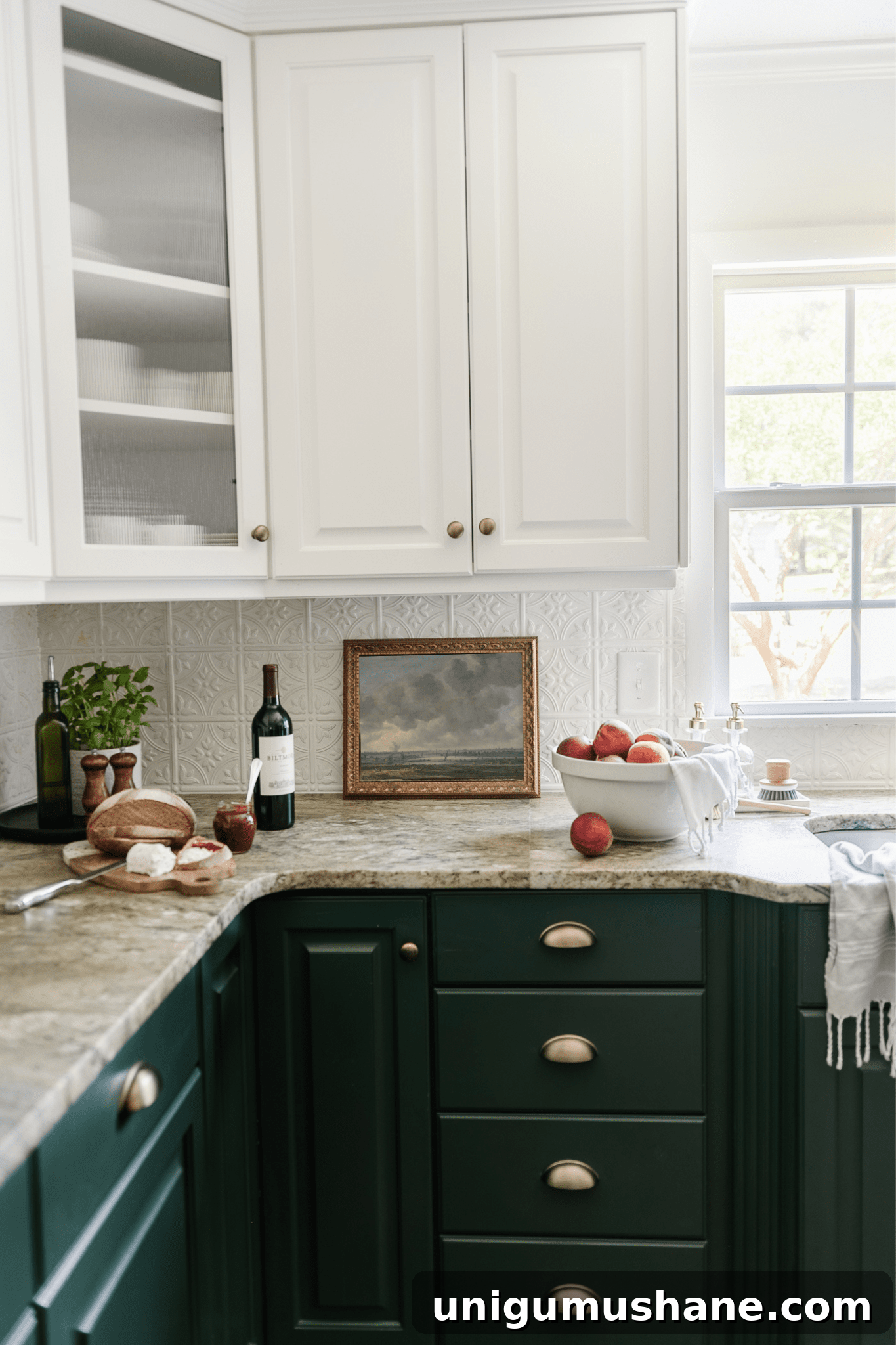 Free Oil Painting Prints for Kitchen Wall Art 9 framed landscape oil painting print as kitchen art on a countertop with bowl of peaches and tray with a plant