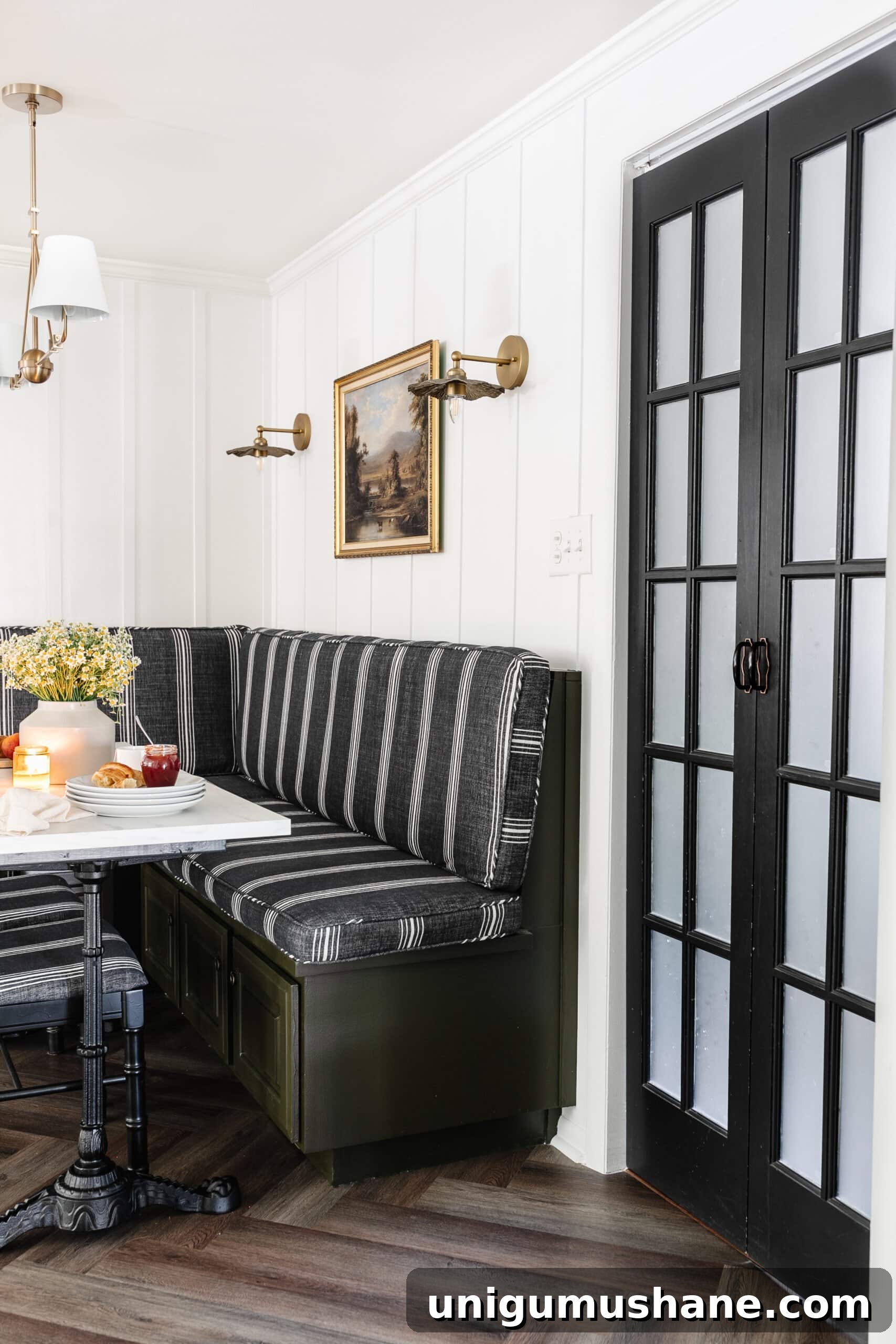 bifold French doors next to a breakfast nook