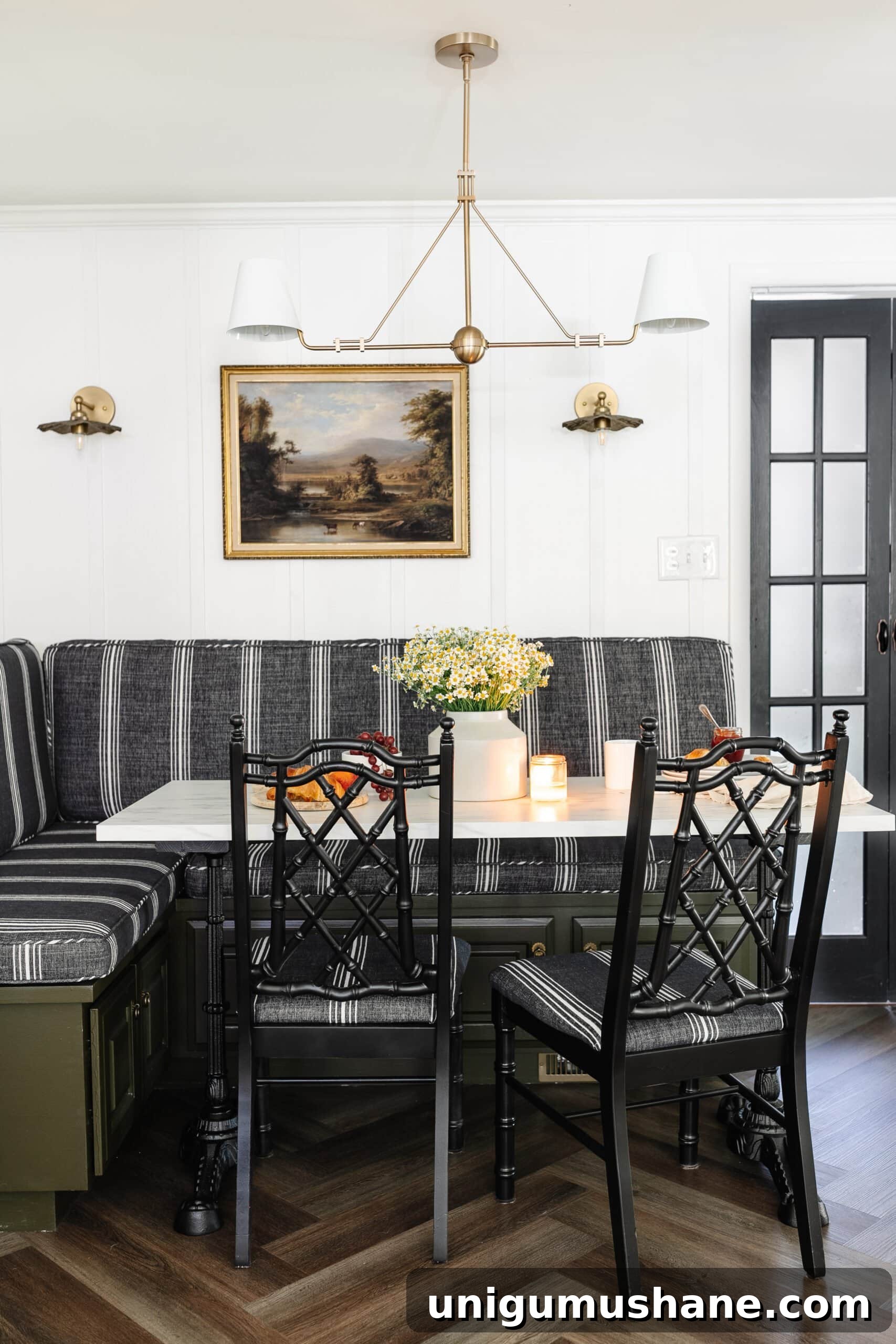 breakfast table with banquette, bamboo chairs, and batten walls
