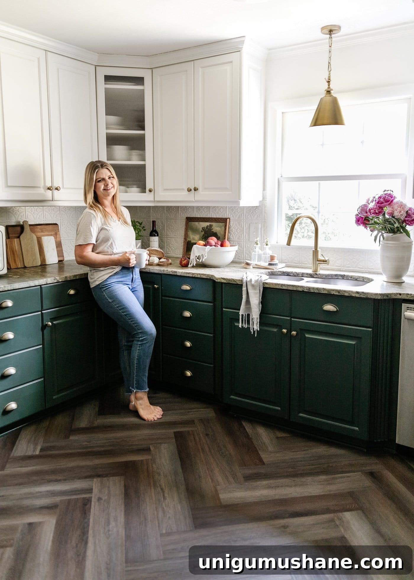 standing in the finished kitchen