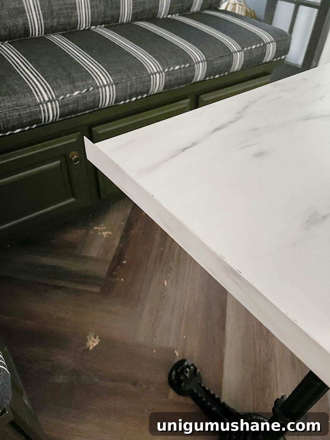 attaching laminate strip to a cut faux marble dining table top