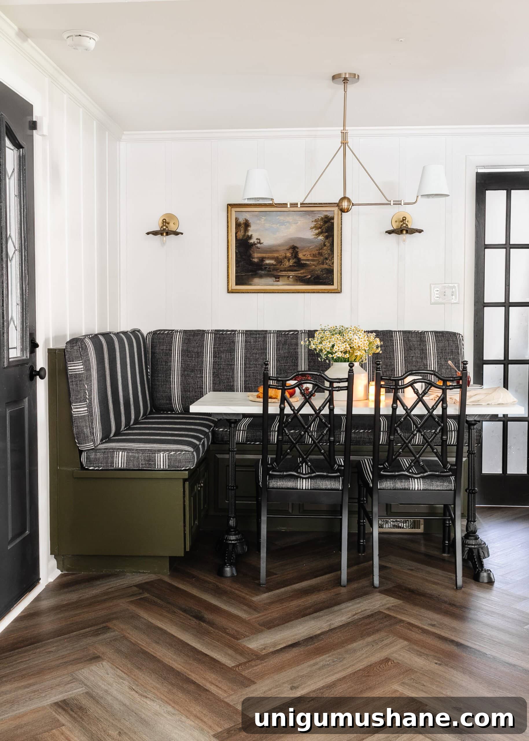 Parisian Bistro-Inspired Breakfast Nook Decor Ideas 17 herringbone floors in a corner breakfast nook with olive green banquette bench, black bamboo chairs, and marble table