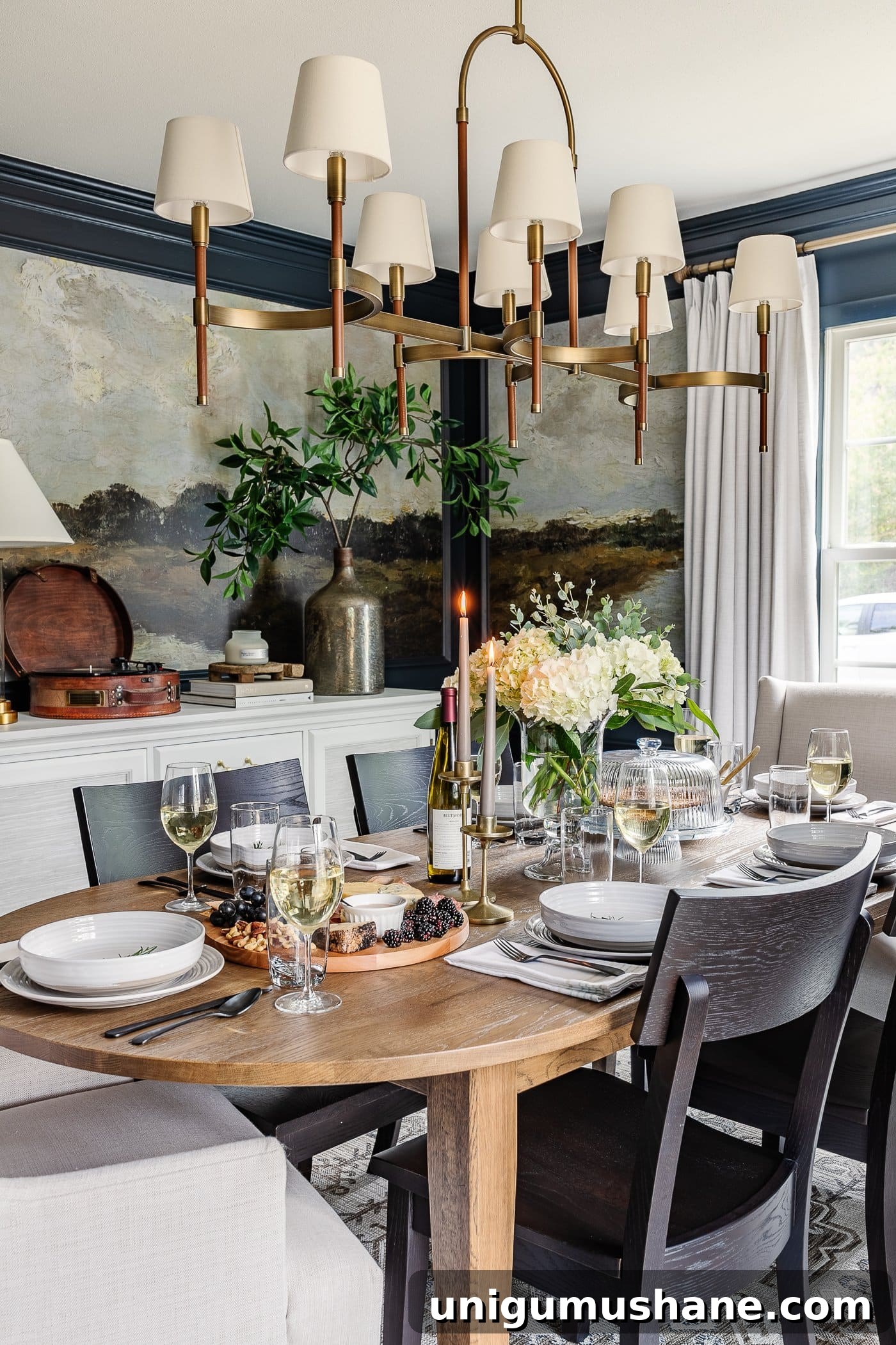 How to Set an Elegant Dinner Table for Any Occasion 4 dinner table decor in a dining room with summer centerpiece, neutral dinnerware, and charcuterie board