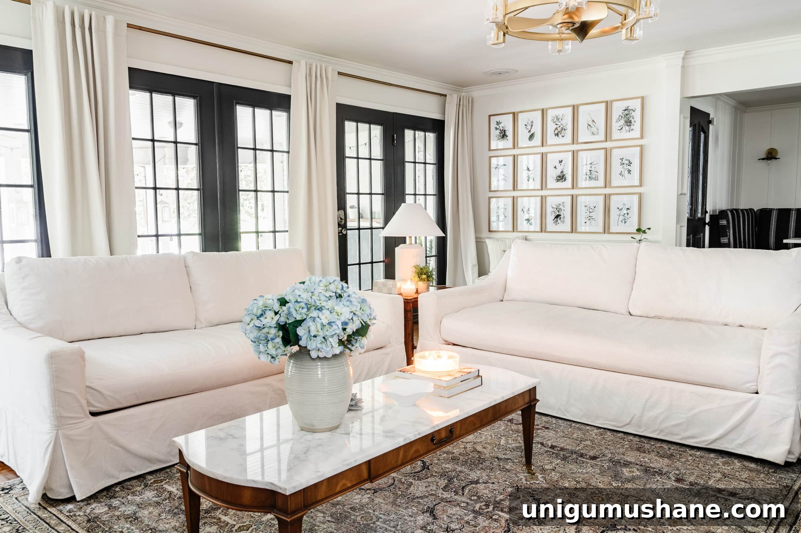 white clean couches with white slipcovers in a living room 
