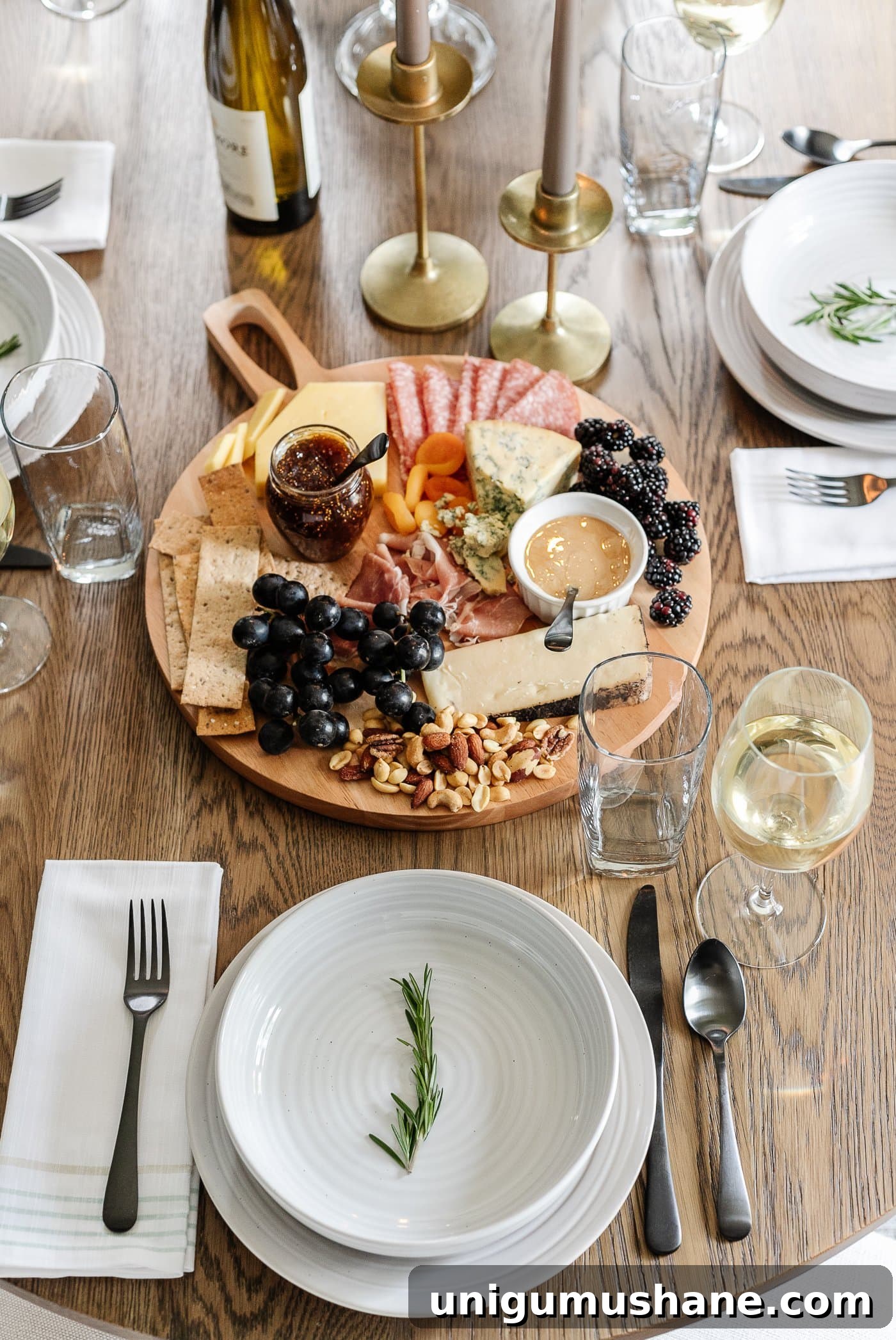 DIY Fall Centerpiece Ideas Using Autumn Branches 19 charcuterie board centerpiece on a dinner table