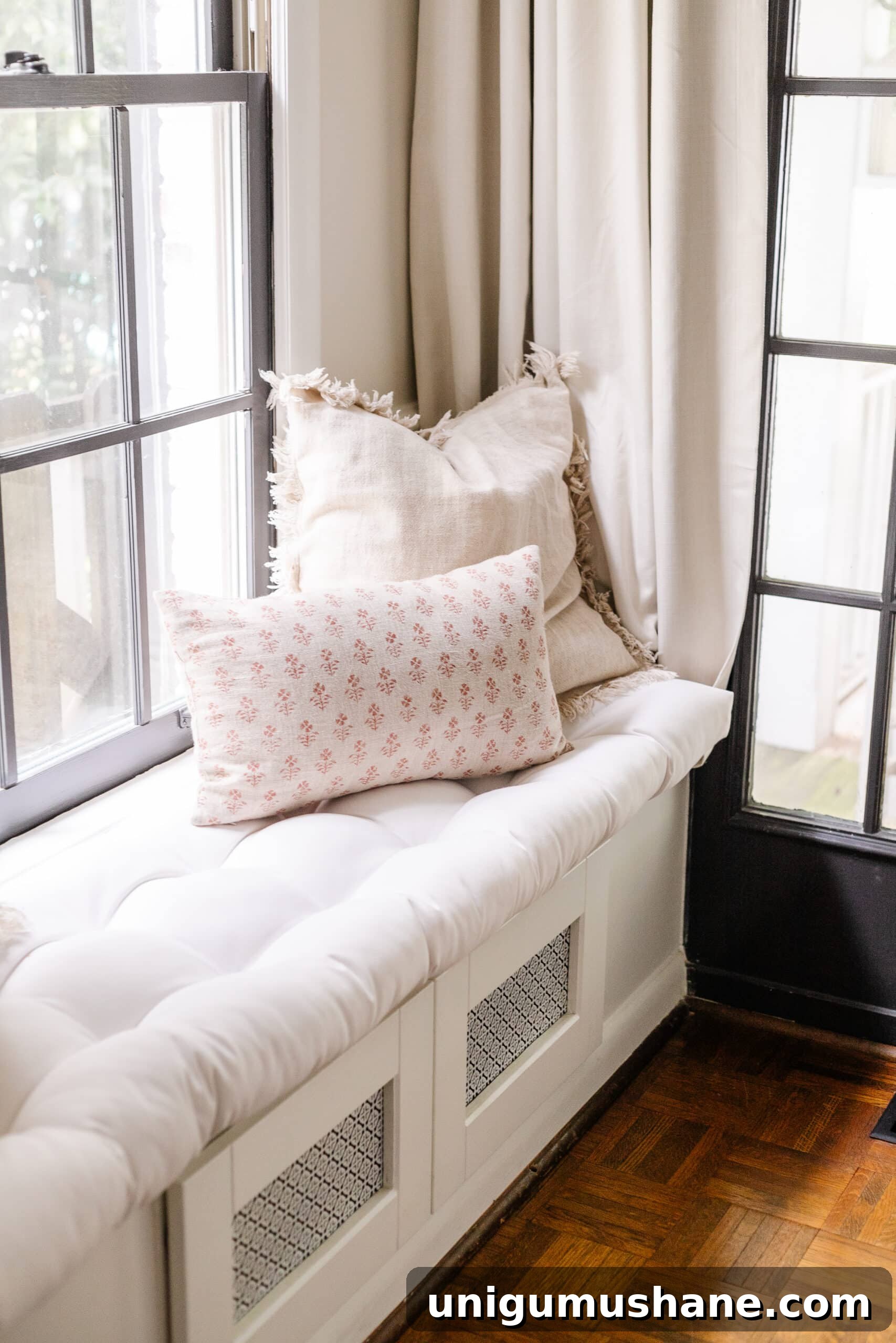 Budget Fall Living Room Decor Ideas That Save Time 13 window seat in a living room with neutral fall pillows